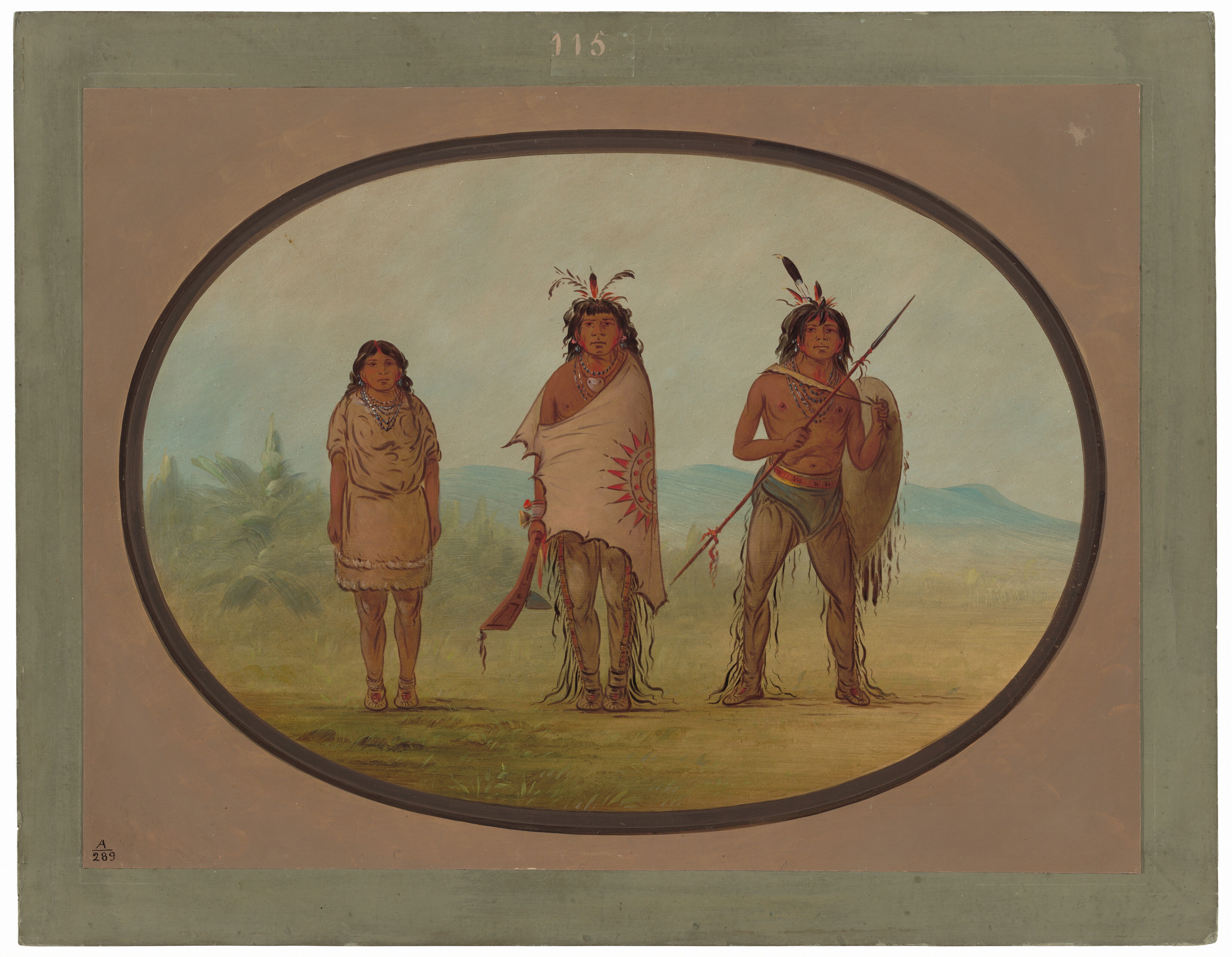 The image depicts three individuals standing against a natural backdrop. The person on the left is a female with long dark hair styled into two braids, wearing a light-colored dress with fringes and beaded necklaces, and is barefoot. The central figure is a male with long hair adorned with feathers, wearing a cloak with a red sunburst design, and jewelry around his neck. The male figure on the right is holding a spear in his right hand and a shield in his left, wearing animal-skin leggings with fringes and a belt, and is barefoot. The background shows green grass, rolling hills, soft blue mountains under a clear sky, framed by an oval border within a rectangular frame.