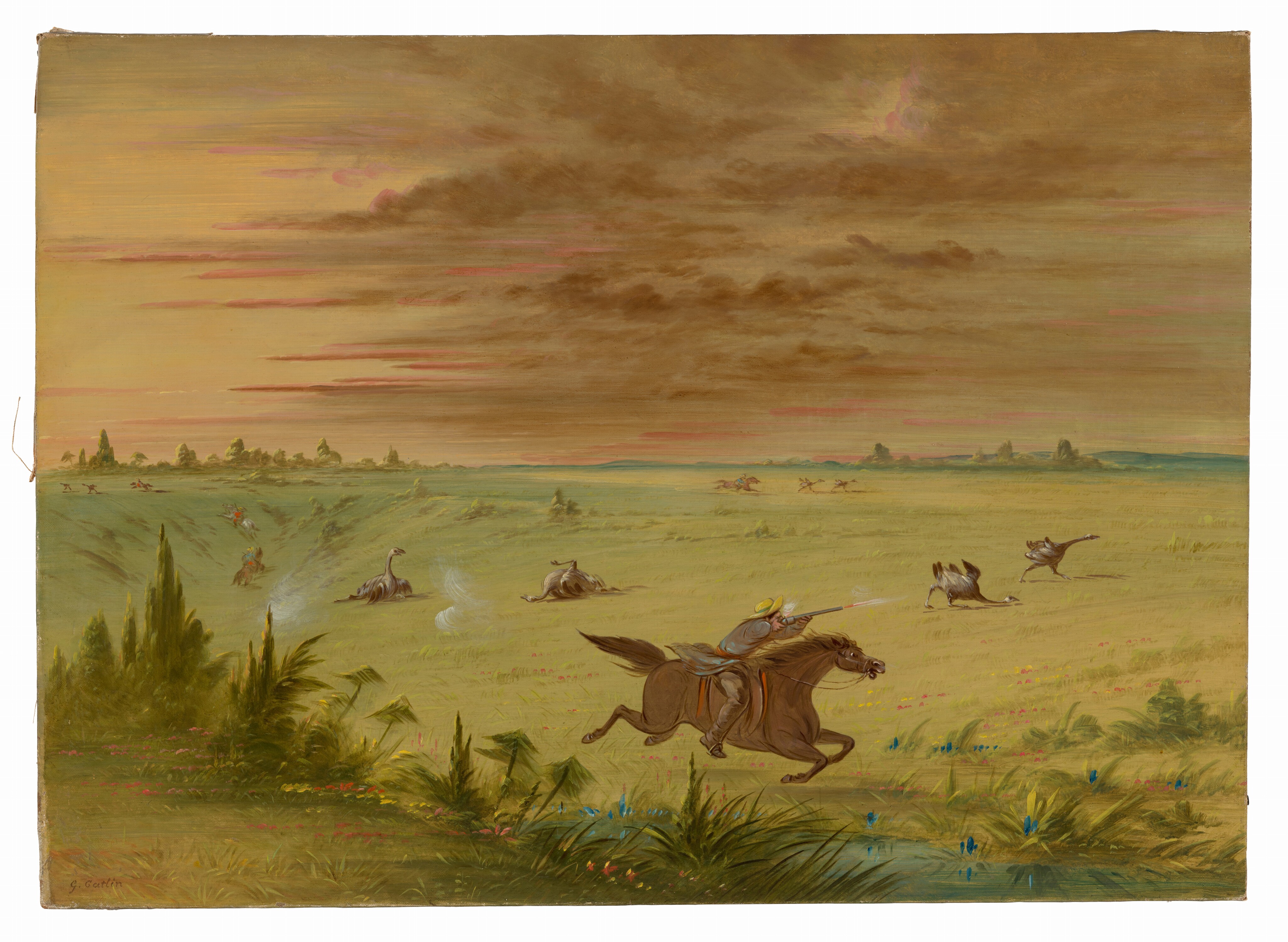 The image displays a landscape with rolling plains and sloping hills in the background. A rider on a galloping horse is depicted aiming a firearm at birds in flight. The painting features detailed brushwork capturing movement. The color palette includes earth tones and muted colors, with green, brown, and soft yellow dominating. The sky is filled with swirling clouds in pink and orange hues. Lush vegetation with green strokes and small colorful flowers can be seen close to us. Additional riders in the distance are engaged in similar activities.