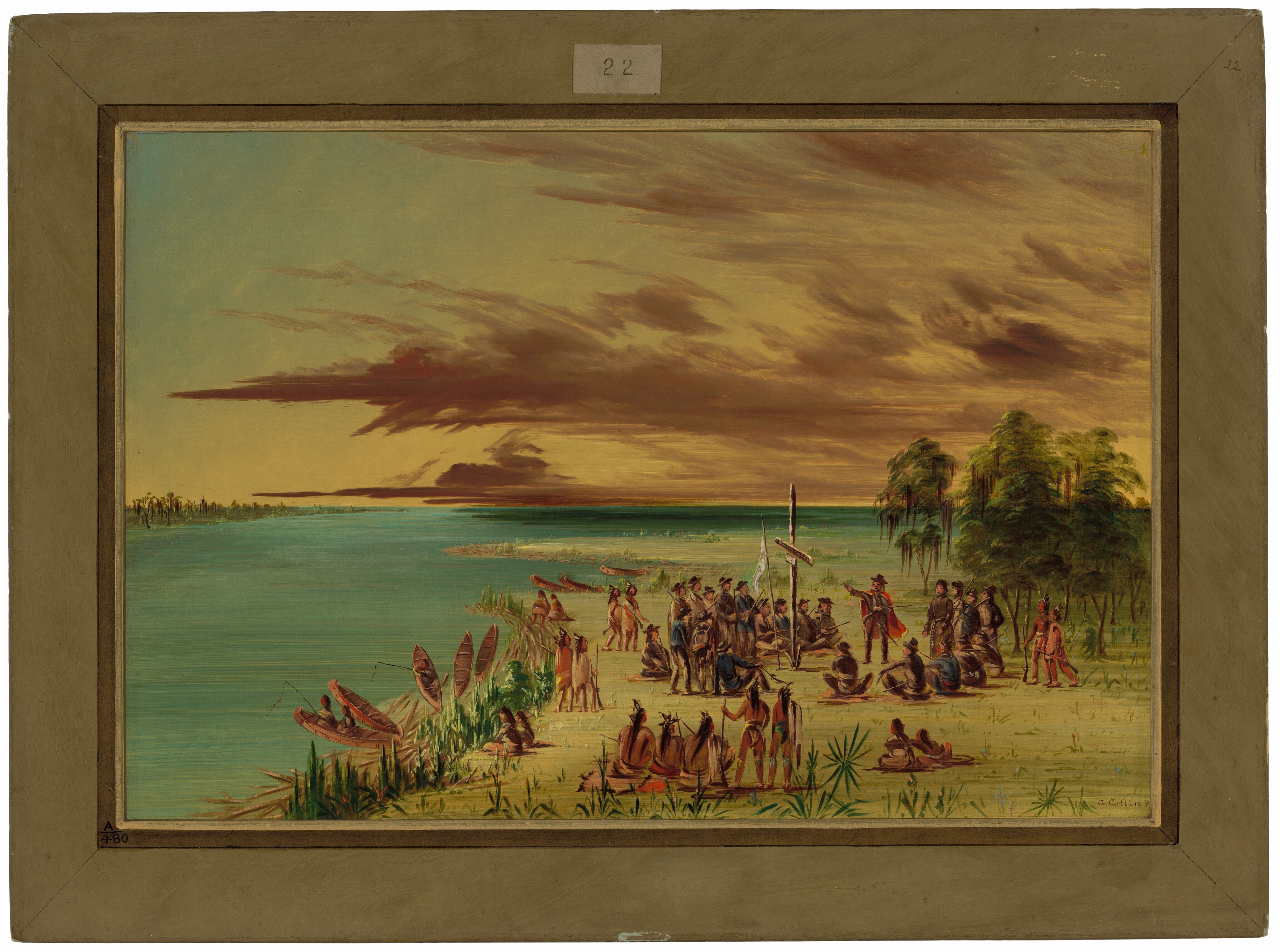 About twenty pale-skinned men and eighteen Indigenous people with medium-toned skin sit or stand in a gathering by a water’s edge in this horizontal landscape painting. Most of the people’s attention are focused on a pale-skinned man who stands and holds a rifle across his torso in one arm and gestures with the other hand extended. He wears a brown suit, dark hat, a red, knee-length cloak, and a sword hangs at one hip. He motions toward a rudimentary cross that stands upright in the marshy grass next to a white flag on a pole. A ring of mostly pale-skinned men sit or stand around this, though one of those seated there appears to have red-colored skin and wear a feathered headdress. These men wear brown pants and brown or blue coats with dark hats. Other Indigenous people with long black hair and some with red face paint stand or sit in an outer ring around the central action. Some of these people are bare-chested and some wear tawny-brown wraps, cloaks, or garments. Eight canoes are lined up along the zigzagging water’s edge in the left half of the painting, and people fish from two of them. The far coastline is lined with green and brown strokes, suggesting trees. Copper-brown clouds sweep across the sky, which darkens from pale yellow along the horizon, halfway up the composition, to blue along the top. The painting appears to be surrounded with a wide brown frame with a slip of paper reading “22” at the top center, but this is all painted and drawn. The artist signed the painting in the lower right corner of the landscape, "G. Catlin P.”