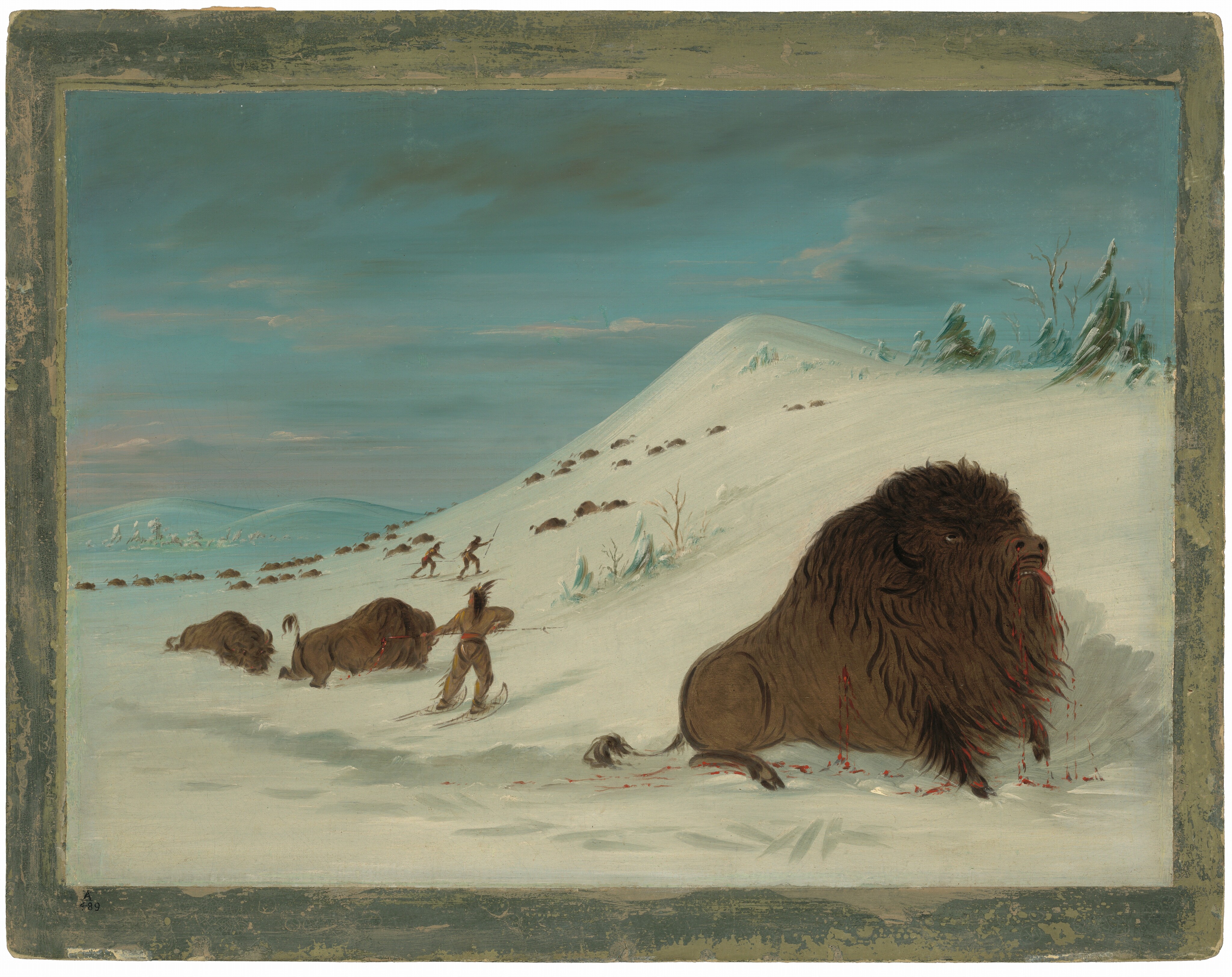 The painting depicts a winter scene with a snowy landscape. In the foreground, a wounded buffalo lies on the snow, with blood visible on its fur. Further away, another buffalo is on the ground, and two figures with snowshoes approach. In the background, there are rolling hills and groups of buffalo. The sky is bright cerulean with hints of pink and gray. Snow-covered pine trees are on the right. The brushstrokes are detailed for the buffalo and smoother for the snow and sky, creating a serene winter atmosphere.