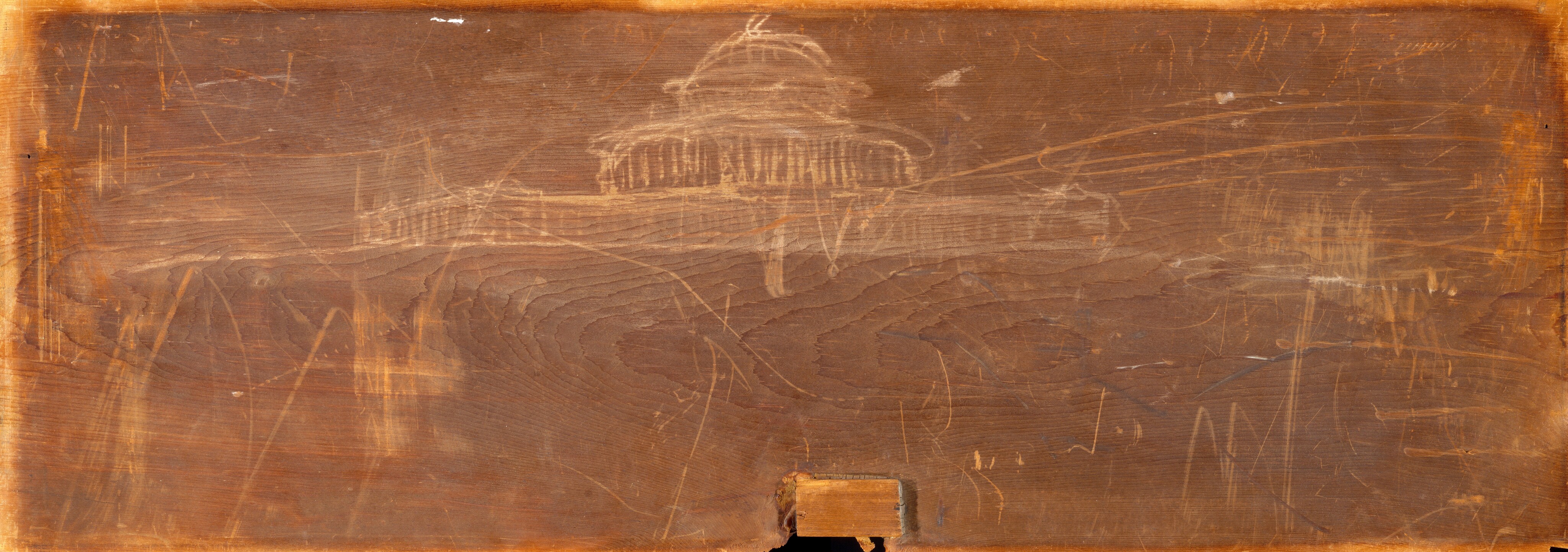 This drawing shows the faint outline of a domed building. The representation is minimalistic, with few details of the building shown besides the dome and vertical lines that might suggest columns. The drawing is in pale yellow lines on a reddish-brown surface which is covered with other small scratches and lines.
