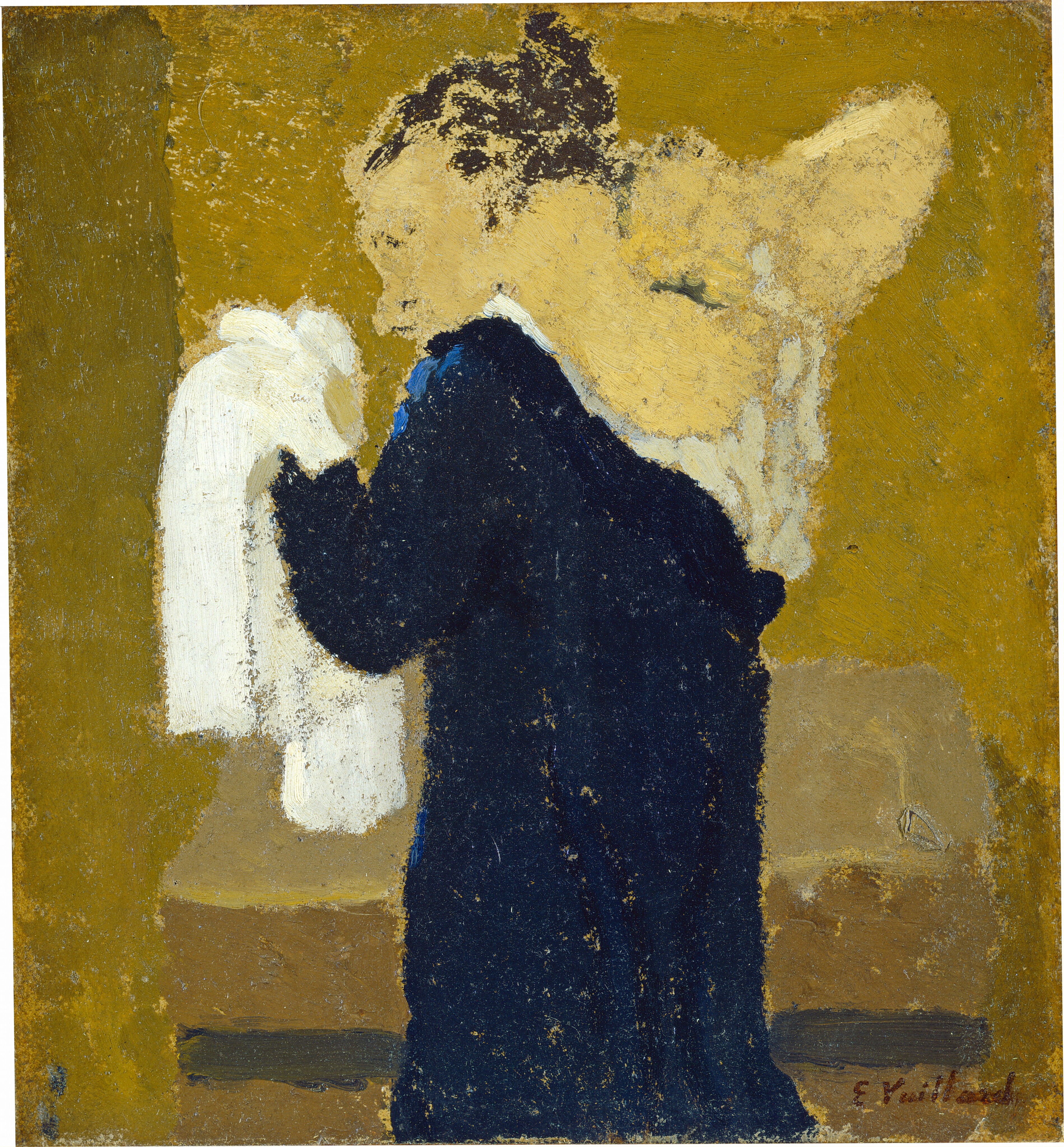This painting shows a woman with her face turned to the left and her back to us, holding a piece of white fabric in her left hand. She has pale yellow skin and dark brown hair tied up into a loose bun or knot at the back of her head. Her face is blurred, with no features beyond the vague outline of a nose and a few dots of paint suggesting an eye. She is wearing a long, dark blue long garment that she appears to be putting on or taking off, with her right hand raised up to her shoulder. Behind her is a low brown table or countertop, and the background is painted in muted mustard and beige tones. The brushstrokes are thick and visible on top of a textured surface.