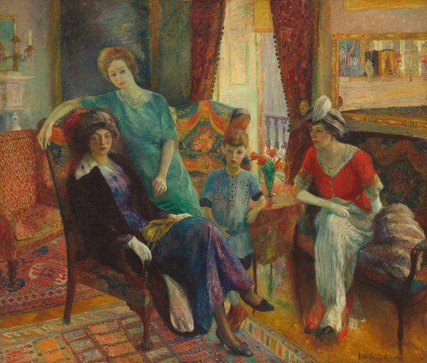 This painting shows four individuals - three women and one child - in an indoor setting. One woman is seated on a chair on the left, wearing a purple and blue dress under a black coat, with white gloves and a gray hat. Next to her, sitting on an arm of the chair, is another woman with blonde hair, wearing a light teal dress. To the right, in the center of the painting, a child stands, wearing a blue dress or tunic. On the far right, a third woman sits on a bench, wearing a bright red-and-white dress with a white-and-blue hat capped with a white feather, as well as long white gloves. All of the people have pale skin, and their faces are detailed. The room around them has other colorful furniture, including two armchairs in shades of red and teal, and the walls are in shades of light blue and cream. Red curtains hang over an open window or balcony, and there's a painting in a gold frame on a wall on the right. The orange floor beneath them is covered in several colorful, patterned rugs.