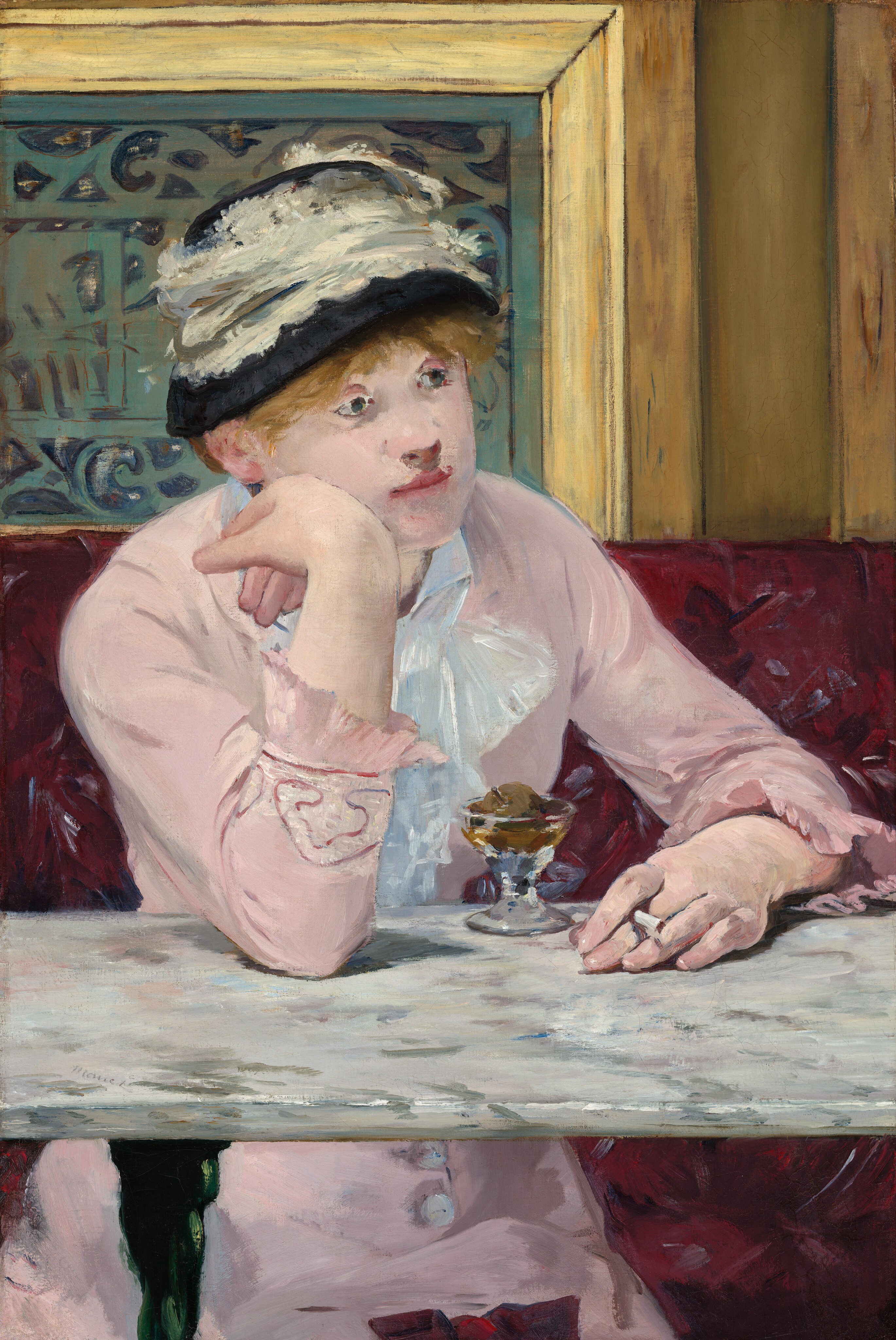 A woman with light skin sits facing us across a marble-topped table in a café in this vertical painting. Her body is angled slightly to our right, and she rests her right elbow, on our left, on the table. She leans her right cheek onto the back of her right hand as she gazes into the distance. She holds a cigarette in her other hand, which rests on the tabletop. Her pale pink dress has long sleeves with ruffles at the cuffs, and buttons down the front of the skirt can be seen under the table. A lace bow or ruffles cascade down at her neck. Straw-colored hair peeks out under a black hat encircled with a wide band of lace. A short, stemmed glass sitting on the table in front of her holds a small, round piece of fruit surrounded by caramel-colored liquid. The white marble tabletop is streaked with gray. The burgundy, patterned banquette she sits on takes up the bottom half of the composition, and wood paneling around a slate-gray metal grate fills the top half. Loose brushstrokes are visible throughout. The artist signed the work as if he had written his name on the surface of the table, near the front edge to our left, "Manet."