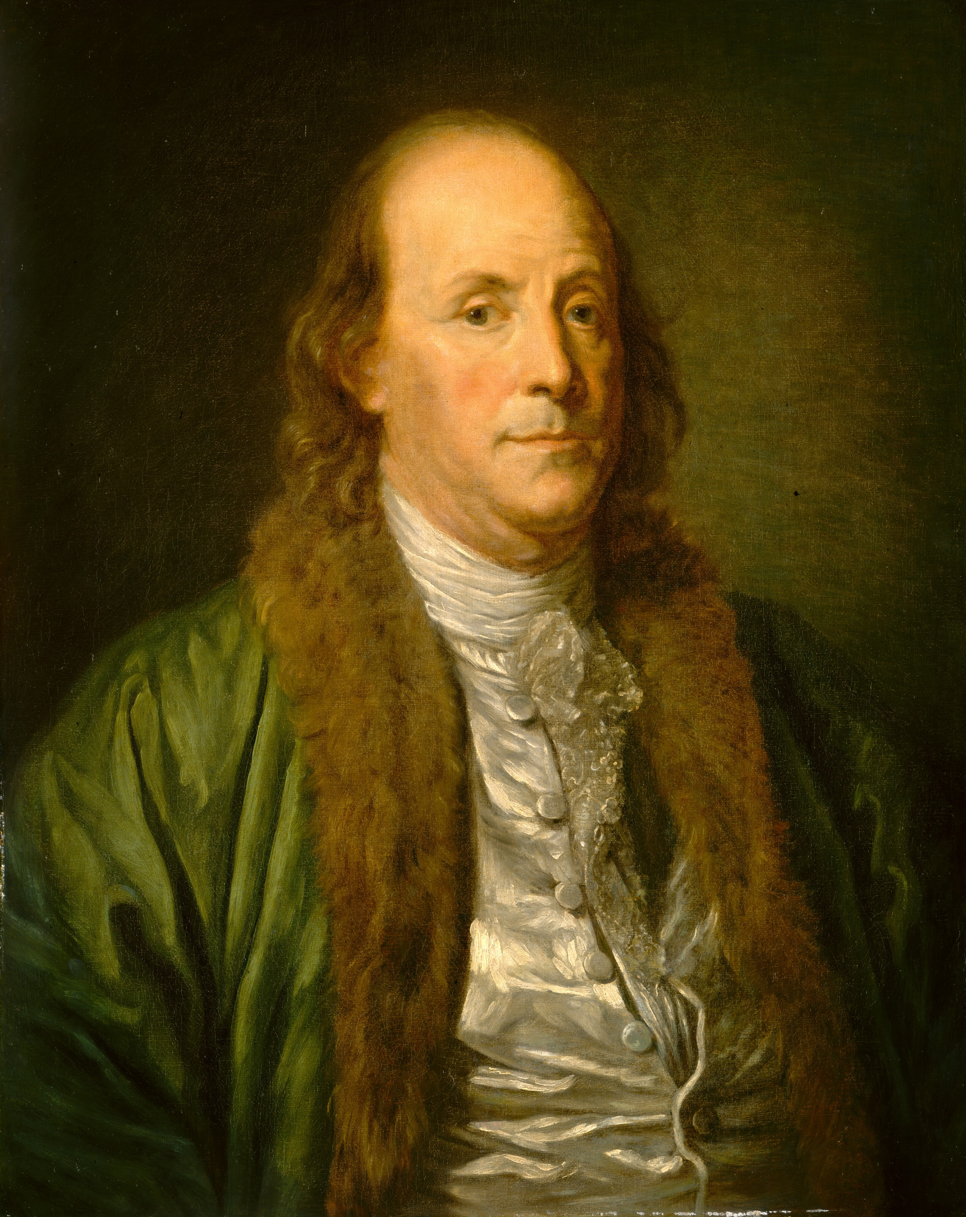 This painting shows the upper body of a man in a seated position, turned slightly to the right, with his face looking towards us. His features include light skin, a high forehead, a thin mouth, and deep-set eyes. Though the brown-gray hair on top of his head is thin, it is long on the sides and falls around his chin. He wears a green coat with brown fur trim and a detailed white vest with ruffles near the neck. The background is a plain green color, which is darker around the edges and lighter near the center of the painting.