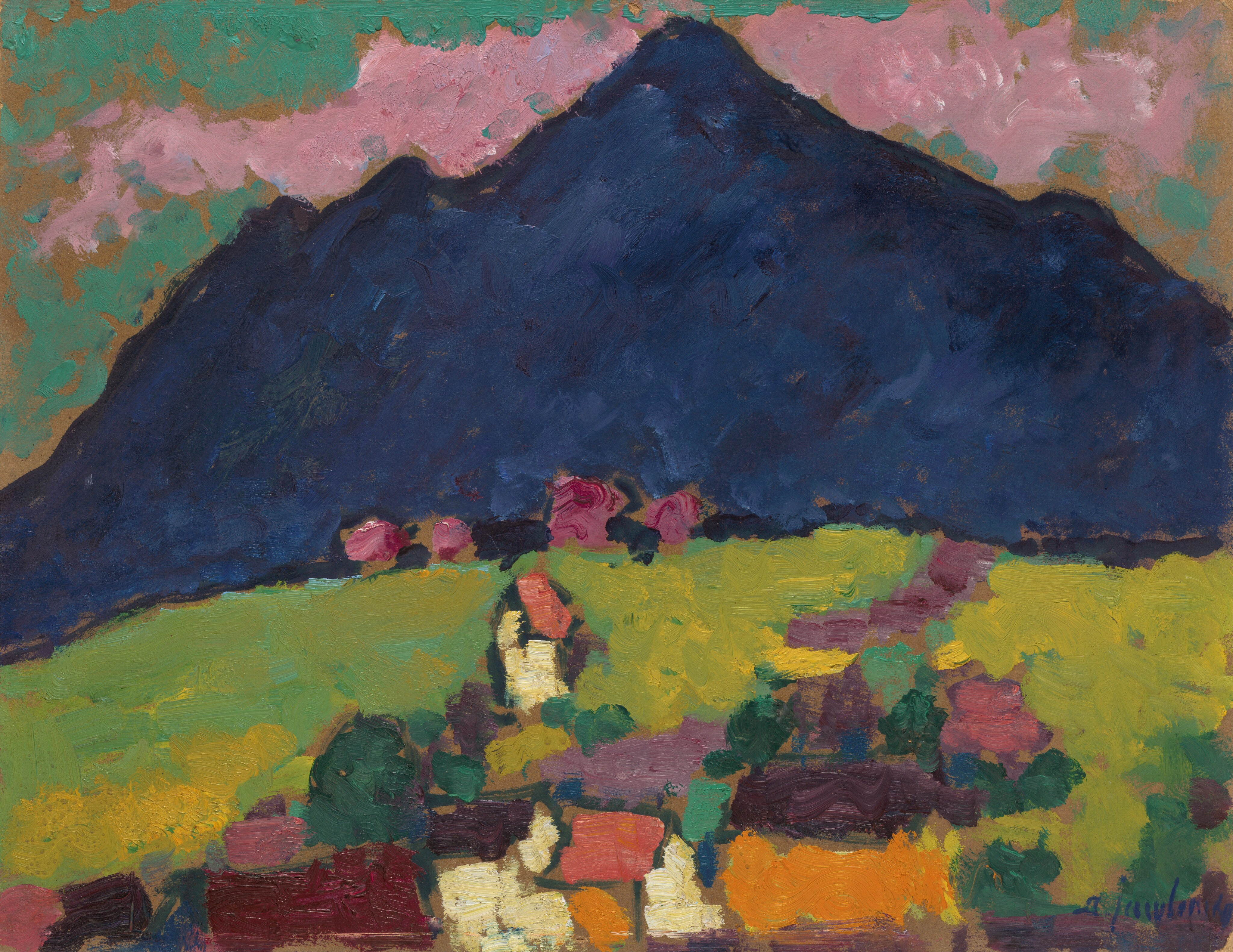 The painting shows a landscape with a large, dark blue mountain in the background. Below the mountain are blocks of color, suggesting fields and structures. The area is filled with colors including yellows, oranges, reds, purples, and greens. The sky above the mountain is painted in a teal color with light pink clouds. The painting features thick brushstrokes, and the shapes lack specific details.