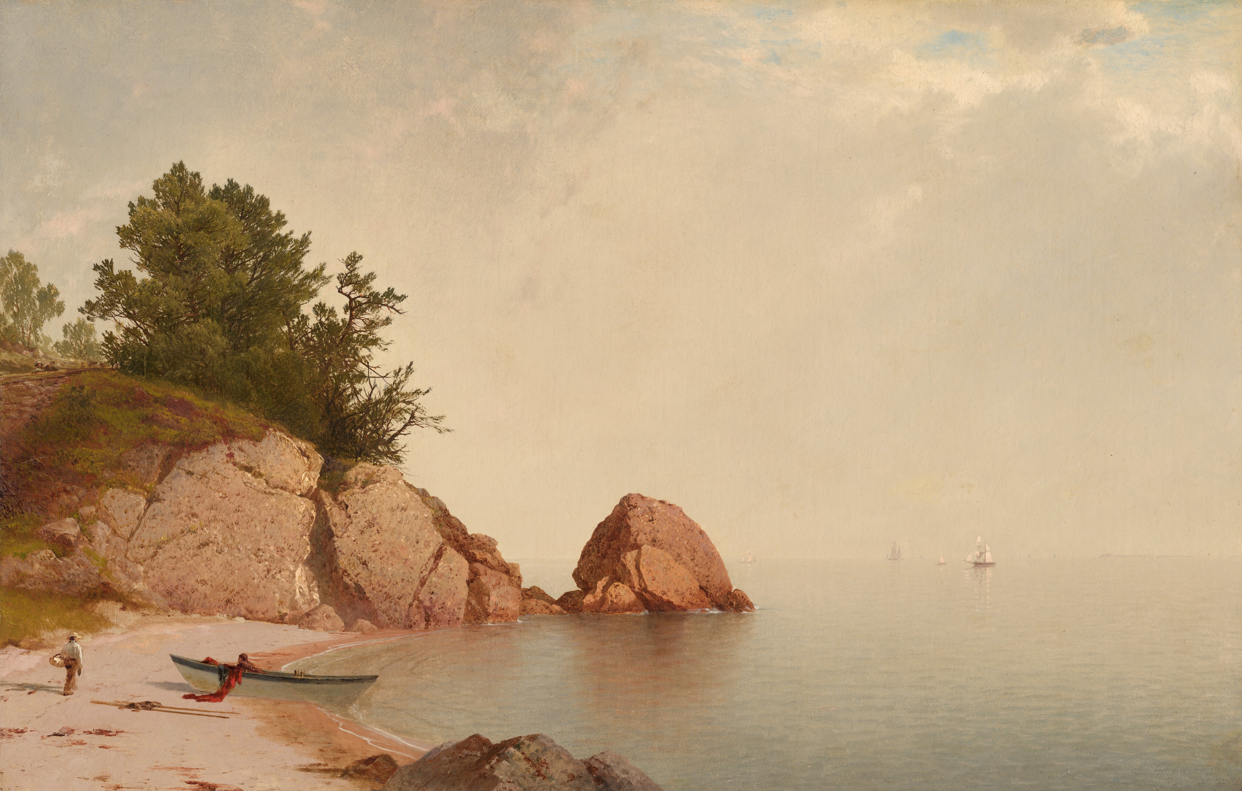 A pink-toned sandy beach meets a placid body of pale blue water under a hazy sky in this horizontal landscape painting. To our left, the beach curves like a letter C to end in the near distance with a terracotta-orange rocky outcropping and a boulder, which comes halfway across the composition. Muted green trees grow atop the outcropping, and the left half is blanketed in moss or grass. A white rowboat has been pulled into the sand about halfway along the beach. One person sits or crouches inside, and a red cloth or net hangs over the side closer to us. A person wearing a straw hat, white, long-sleeved shirt, and brown pants carries a basket over one arm as they walk away from us, not far from the rowboat. The water is very light blue where it laps gently at the shore but is washed by diffuse sunlight to parchment white in the distance. The horizon, which comes a third of the way up the canvas, nearly blends into the milky white bank of clouds above. A few sailboats are near the horizon on the right half of the painting, and a few small patches of blue sky show through the clouds in the upper right corner.