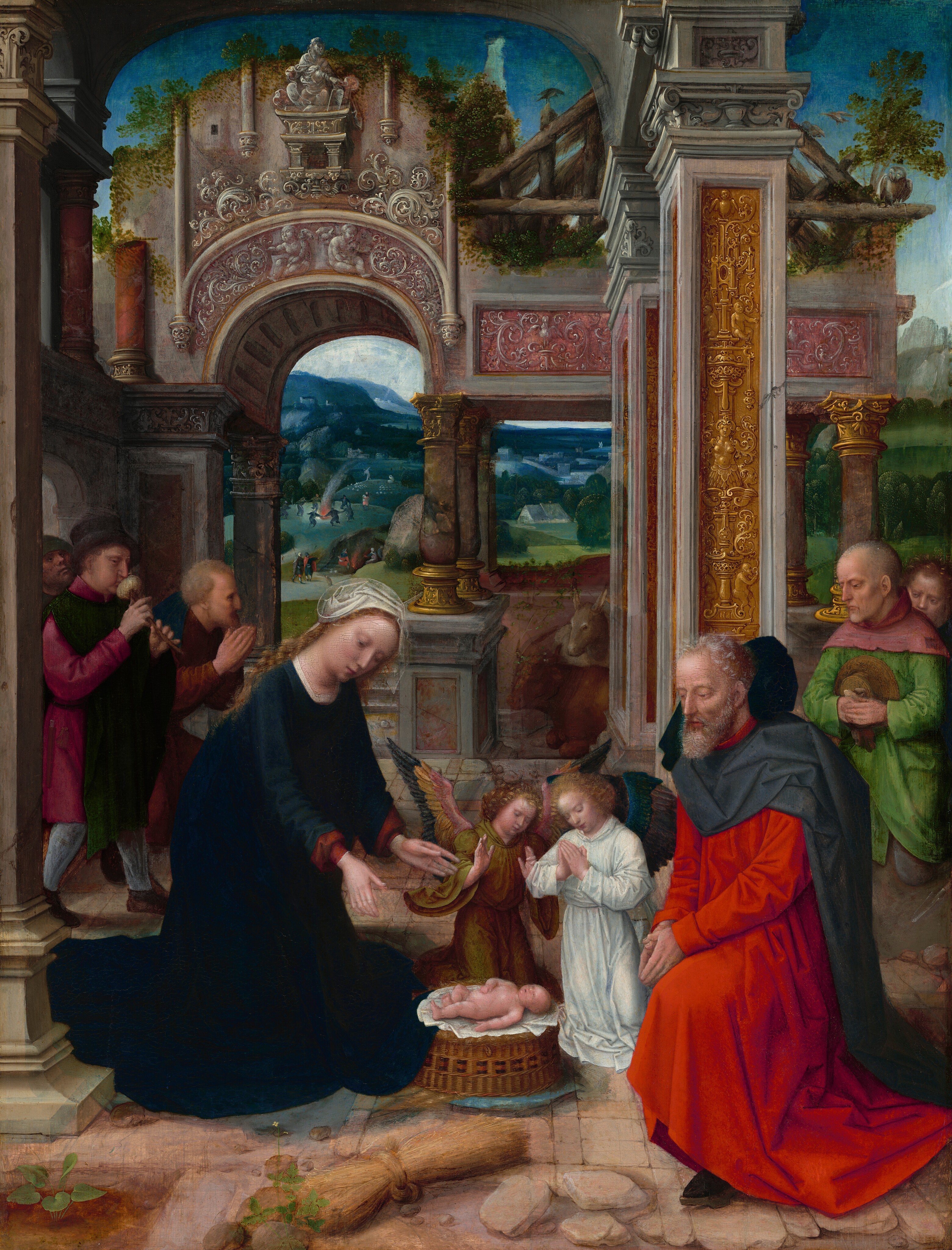 A young woman and older man accompanied by two winged angels kneel to gaze at a tiny infant lying on an overturned basket in this vertical painting. They and the five men standing or kneeling to each side all have pale skin. The woman, Mary, is on our left and leans forward with her hands stretched out toward the infant. Her long, honey-blond hair is covered with a pleated white cloth, and she wears a marine-blue gown over a garment with garnet-red sleeves. The older man, Joseph, kneels opposite her. He has a gray beard and hair and wears a charcoal-gray cloak over a scarlet-red robe. The nude infant, Jesus, lies on the basket between them next to a bundle of wheat. The angels are about half the size of Mary and Joseph and kneel just beyond Jesus. They both have blond hair and wings striped in shades of carnation pink, canary yellow, and celestial blue. The angel on our left wears an olive-green robe, and the other wears a white robe shaded with arctic blue. Mary, Joseph, Jesus, and the angels gather on a worn, tiled stone floor outside the ruins of a building with an exposed interior. Ornamented bronze and rose-pink panels are set into pillars and over openings. Ivy grows along the upper edges of the partially ruined walls, and small tree branches sprout on the roof. An owl and another bird perch on the remains of a wood roof tucked behind the first structure. An ox and a donkey are tucked into a back corner of the building below. Three men dressed in burgundy and black enter the ruins from the left. One wears a soft black hat and holds a musical instrument to his lips. Two more men kneel beyond Joseph on the right, and one wears pea green with a rose-pink cape. The background beyond the building and people is filled with a green and blue landscape scattered with buildings and tiny people walking and dancing around a fire.