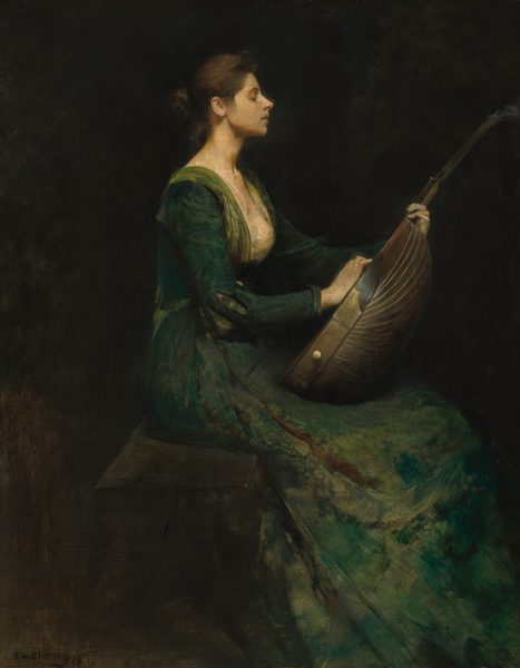 A woman sits facing our right in profile, looking through downcast eyes at a lute she holds upright in her lap in this vertical painting. She has smooth, pale skin, and her tawny-brown hair is pulled gathered at the back of her neck. She holds her head high, so she looks down through lowered eyes toward her lap. Her full, pale-pink lips are slightly parted. Her long gown swirls with tones of pine, moss, and sage green with a few strokes of earth brown. Her garment, especially around the neckline, is loosely painted so it is difficult to tell if her decolletage is bare or is covered by a sheer fabric. The sleeve we see is slashed along the elbow so fabric in lighter green shows through. Her dress drapes over her feet, which are cropped by the bottom right corner of the composition. The woman is brightly lit from the upper center, but the bench on which she sits blends into the nearly black background. She braces the neck of the lute where it meets the body with long, delicate fingers, so the instrument stands in her lap with the flat soundboard facing her. The neck tips slightly away from her body, and she rests her right hand, closer to us, on the soundboard with her fingers crooked. The lute is a mahogany brown and has radiating lines that extend from the side closest to us up along the back of the body. The pegboard at the top of the neck is barely cropped by the right edge of the composition. The lute is finely detailed, which contrasts with the loose brushwork of the woman’s dress. The artist signed and dated the painting in the lower left corner, “TW Dewing 86.”