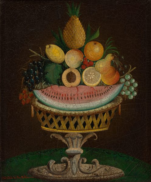 The image displays a still life arrangement of various fruits on an intricate pedestal. It includes a watermelon slice, pineapple, lemons, orange, grapes, peaches, and berries among others. Colors range from deep greens to vibrant yellows, reds, and soft pinks set against a dark background. Fruits are centrally placed, with the watermelon forming a horizontal base near the top of the pedestal, while the pineapple and citrus fruits are stacked above it, slightly right of center.