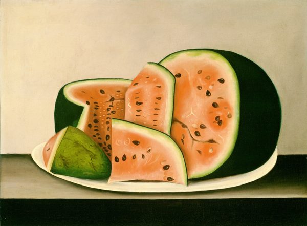 This painting shows a sliced watermelon on a white plate. The watermelon has red-pink flesh dotted with black seeds and smaller white seeds and surrounded by a dark green rind. Half of the watermelon is intact on the right, while the other half has been cut up in sections of different sizes on the left. The surface under the plate is gray with black shadows, and the background is gray.