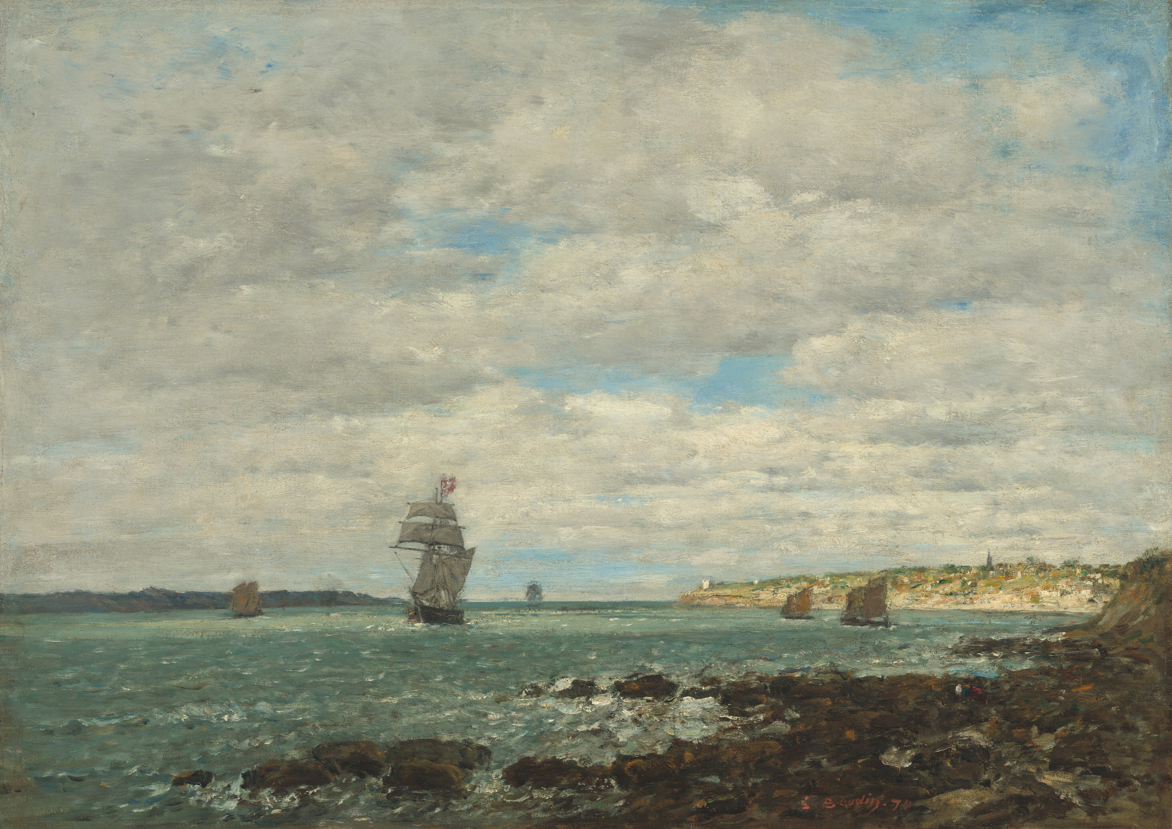 The painting depicts a seascape. The horizon is visible in the bottom third of the composition, with several ships floating on the water, including a large sailing ship to the left of center. In the distance on the right, there is a tan and green coastline with hints of buildings that extend towards the center of the painting. Another distant coastline is visible on the left, painted in dark gray. The water closest to us is in greenish-blue tones with areas of white suggesting choppy waves, while a rocky outcrop in the bottom right corner is depicted in earthy brown hues. The sky takes up the upper two-thirds of the painting, and it is light blue and covered in thick white and gray clouds.