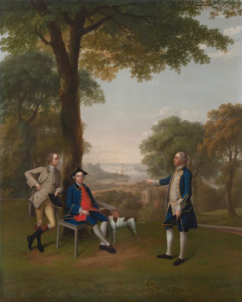 This painting shows three men and one dog in an outdoor setting. To the left of center is a seated man looking out at us, wearing a blue coat and pants with gold trim, a red vest, white stockings, and black shoes, his curled gray hair under a black tricorn hat. Leaning against a tree behind the seated man is another man who wears a gray coat and vest with tan pants and tall, knee-length black boots. He holds a long, thin stick in one hand and a black tricorn hat in the other. This man has gray-brown hair that is also curled. He looks to the right, where the third man stands. The man on the right wears a blue-and-gray coat with gold trim, a gray vest, white stockings, and black shoes, with curled gray hair. He holds a black tricorn hat in one hand and uses the other hand to point towards the seated man. All three men have pale skin. A brown-and-white dog stands next to the seated man, its head resting on the man's thigh. The background consists of a green landscape with tall trees, distant gray buildings, and ships on the blue water in the distance. The sky above is light blue with a few wispy white clouds.