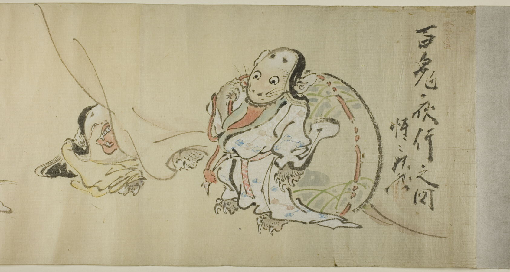 A work made of handscroll; ink and colors on paper.