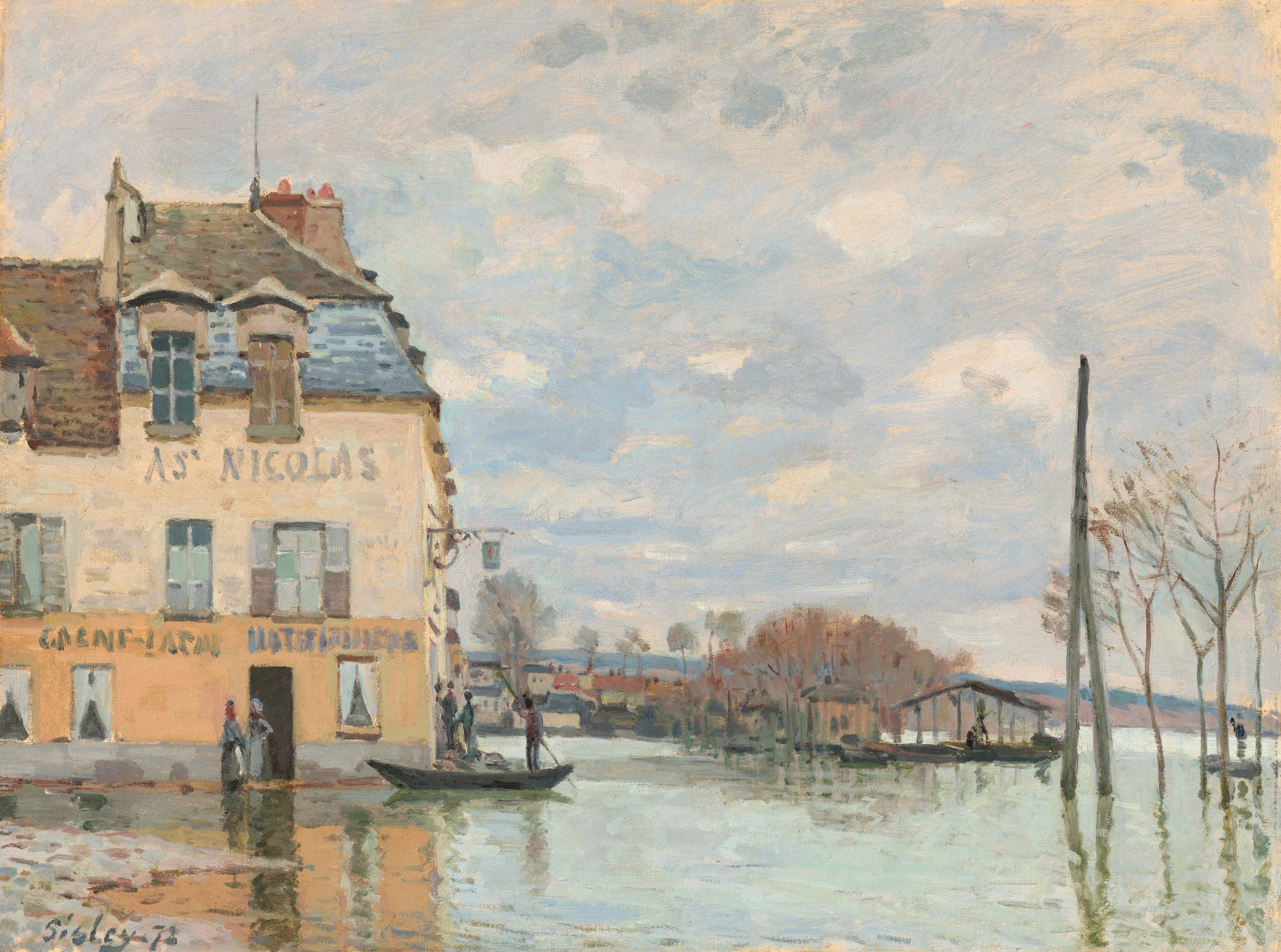 Clouds hunker over a water-logged street that separates us from the end of a row of buildings in this horizontal painting. The scene is loosely painted, especially in the sky and water. The lowest level of the building across from us is apricot orange. The second story is pale peach, and dormered windows cut into the gray and then brown rooflines above. The words “AS’ NICOLAS” are painted in gray near the top of the second level, and more letters on the level below are illegible. The roofline drops down a level where it meets the structure next to it, along the left edge of the canvas. Two women in long skirts stand at a darkened, open doorway near the front corner of the structure. A sign on the side of the building hangs from a horizontal arm over three men in and near a shallow boat, which is being propelled by a man who stands in the stern with a long stick. The street is so wet that it first appears to be a canal or river. It is only when we notice dashes of mauve, pale pink, and gray to our left that we realize the cobblestone road is flooded. A band of buildings with tan walls and black or red roofs spans the right two-thirds of the horizon, which comes about a quarter of the way up this composition. A grove of cinnamon-brown trees and some open structures could be a submerged park in the near distance. Two poles and some spindly trees to our right are reflected in the water. Dark forms around these areas could be more people. Pale blue and very pale pink whip together in the sky, suggesting churning clouds veiling the blue sky. The artist signed and dated the work in the lower left corner, “Sisley 72.”