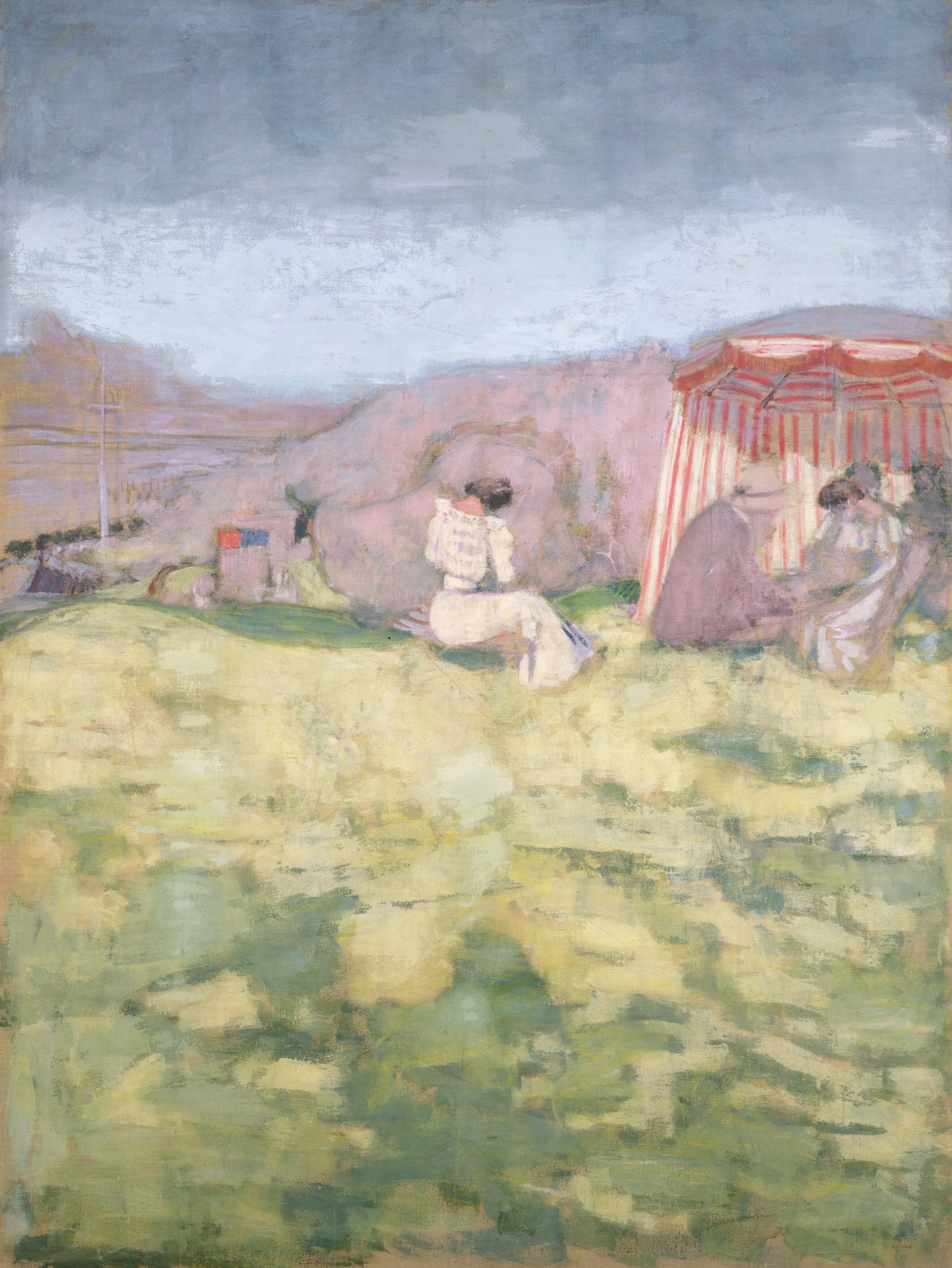 This painting shows a grassy landscape from a slightly elevated angle. The horizon is high in the composition, with faint pink-and-yellow mountains or hills under a muted gray-blue sky. Closest to us, light greens and yellows suggest grass. A group of people is seated on the right under a red-and-white striped tent. They appear to wear garments in shades of purple, black, and white, and they are all wearing hats. We can't see their facial features. In the center, a woman in a white dress sits on the grass, her back to us. On the left, some indistinct colorful objects are on the grass. The brushstrokes in the painting are thick and visible, giving a dream-like, blurred quality to the scene.