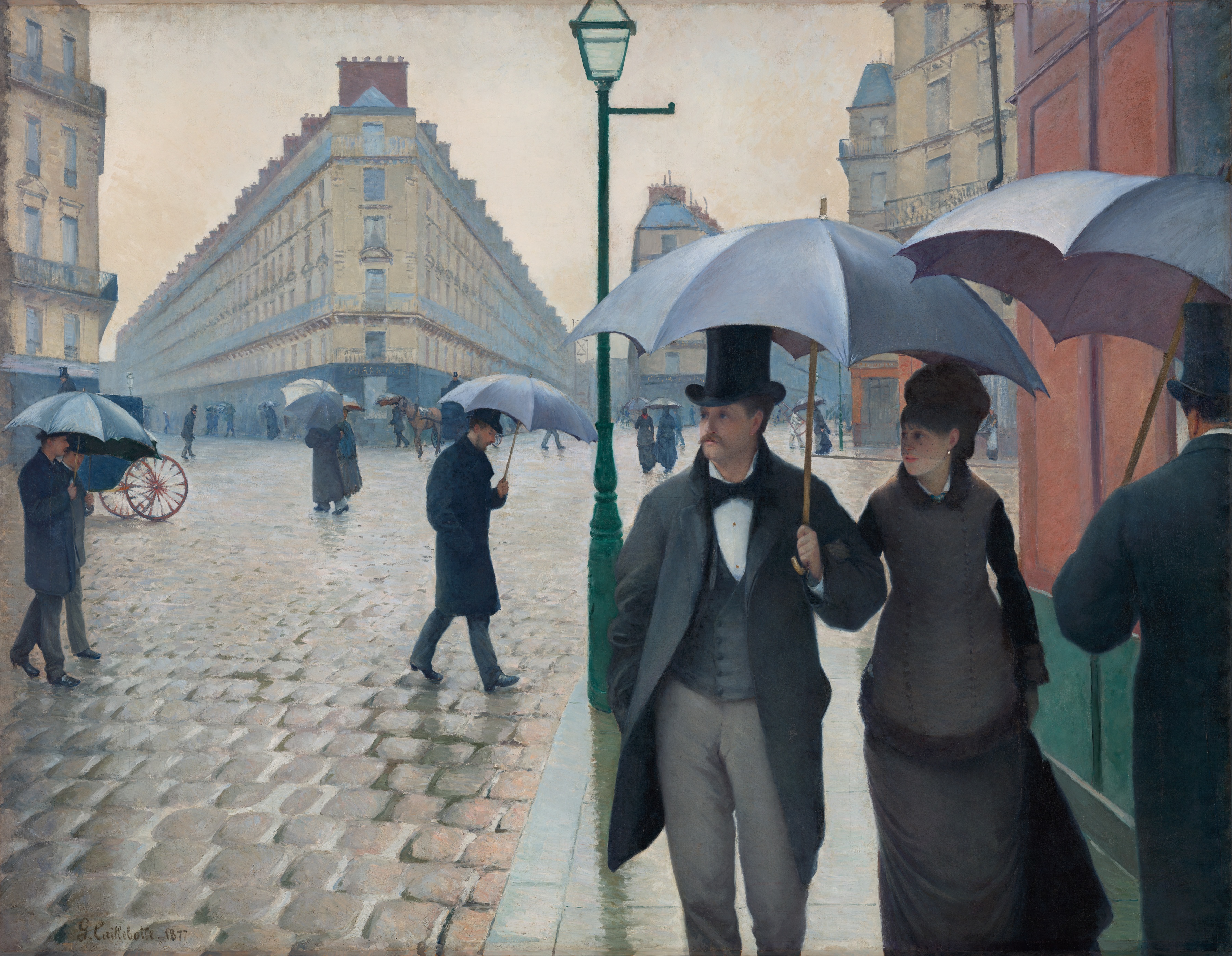 Life-size painting of an urban scene in Paris. A man in a top hat holding an umbrella and a woman in a long fashionable dark dress walk arm in arm toward the viewer as other city dwellers with umbrellas walk in various directions across cobblestone roads and sidewalks.