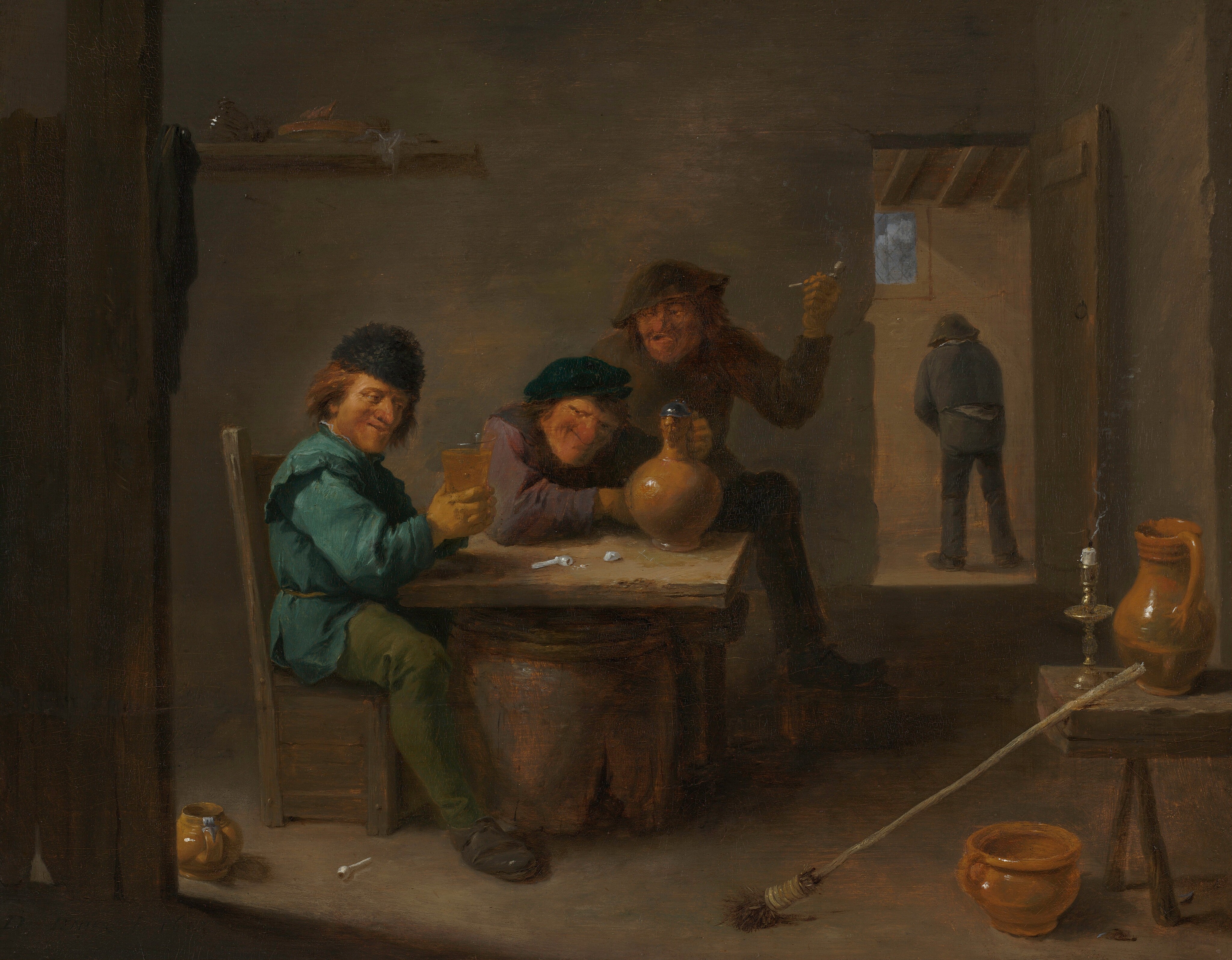 Three pale-skinned people gather around a wooden table in a dimly lit tavern as a fourth person urinates against a wall in a back room in this horizontal painting. The table is a square board resting on a broken barrel. All three men at the table have prominent, reddened noses set in wide faces, and they wear clothing and hats in tones of spruce blue, olive green, muted purple, gray, or brown. One man sits on the left side of the table, holding a glass of beer with both hands. He wears what might be a furry cap. His face is turned slightly toward us but he looks down and to our right. The other seated man is across from us. He grins widely as he hunches over one forearm and holds the neck of a lidded ceramic jug with his other hand. He has a long, chunky chin and stares out at us from under a prominent brow ridge. The third man here stands behind, holding up a white clay pipe. His mouth is open, his eyes slitted, possibly crossed, and he hunches down. One foot rests on a low wooden box, a foot warmer. Another white clay pipe and the broken bowl of a pipe sit on the table, and another pipe lies by the first man’s feet. Also across the floor are two pots and a stubby broom, the long handle of which lies against a table holding a brass candlestick. A wisp of smoke rises from the wick in the candle stub. A shelf hung on the wall near the upper left corner of the painting holds a glass vessel and perhaps a plate. Two wooden beams line the left edge of the composition, and a cloth is draped over a nail there. The floor and wall are nearly uniform taupe gray. A rectangular doorway opens into the next room, in the top right corner of the painting. There a man stands facing the wall with both hands down in front of his torso. A window is set high in the wall there and the timbered ceiling is visible. The artist signed the lower left corner the painting, “D Teniers f.” The first two digits of the date read “16.”