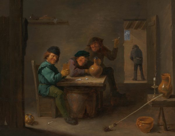 Three pale-skinned people gather around a wooden table in a dimly lit tavern as a fourth person urinates against a wall in a back room in this horizontal painting. The table is a square board resting on a broken barrel. All three men at the table have prominent, reddened noses set in wide faces, and they wear clothing and hats in tones of spruce blue, olive green, muted purple, gray, or brown. One man sits on the left side of the table, holding a glass of beer with both hands. He wears what might be a furry cap. His face is turned slightly toward us but he looks down and to our right. The other seated man is across from us. He grins widely as he hunches over one forearm and holds the neck of a lidded ceramic jug with his other hand. He has a long, chunky chin and stares out at us from under a prominent brow ridge. The third man here stands behind, holding up a white clay pipe. His mouth is open, his eyes slitted, possibly crossed, and he hunches down. One foot rests on a low wooden box, a foot warmer. Another white clay pipe and the broken bowl of a pipe sit on the table, and another pipe lies by the first man’s feet. Also across the floor are two pots and a stubby broom, the long handle of which lies against a table holding a brass candlestick. A wisp of smoke rises from the wick in the candle stub. A shelf hung on the wall near the upper left corner of the painting holds a glass vessel and perhaps a plate. Two wooden beams line the left edge of the composition, and a cloth is draped over a nail there. The floor and wall are nearly uniform taupe gray. A rectangular doorway opens into the next room, in the top right corner of the painting. There a man stands facing the wall with both hands down in front of his torso. A window is set high in the wall there and the timbered ceiling is visible. The artist signed the lower left corner the painting, “D Teniers f.” The first two digits of the date read “16.”