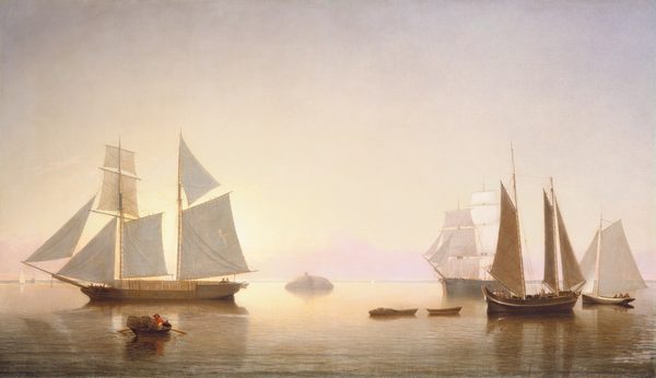 Two ships and two sailboats, all with full sails, float on a gently rippling body of water in front of a pale pastel-shaded sky in this horizontal painting. A rounded rock projects from the water near the center of the painting in the hazy near distance. One ship with two masts to the left of the rock has three people standing on the port side of the deck, closer to us. Between us and the ship, a man wearing a red shirt and a flat-topped brown hat and with two traps on his rowboat travels toward the ship. Three ships cluster to the right of the rock. Four men and seven wooden barrels are aboard a three-masted sailboat with two dinghies trailing behind. To our right is a smaller sailboat with four men gathered in the stern. The third vessel on this side has at least two masts with multiple sails. The rigging of all the ships is delicately outlined against the sky, which is tinged with pale yellow and lavender purple. The low sun behind the sails of the first ship creates a golden glow around the rock and along the horizon, which comes just over a quarter of the way up this painting. The water becomes silvery gray blended with light brown along the bottom edge of the composition. A band of hazy, violet clouds line the low horizon where more white boats sail in the far distance. The artist signed and dated in lower right corner, “F.H.Lane. 1860.”