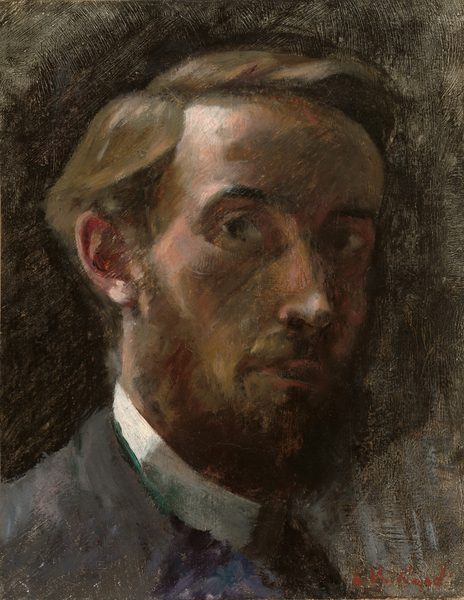 The head of a pale-skinned man nearly fills this shadowy, vertical portrait painting. His shoulders angle to our right, and his dark eyes cut back to look at us. Light from the top left corner highlights his light blond hair, and he has a full beard. He has a straight nose, and his high cheekbones and eye sockets are cast in deep shadow. A high white collar peeks over the lapels of a slate-blue jacket. The background is thinly painted, appearing almost scratched on in some areas, with black against a lighter ground. The brushstrokes are loose and visible throughout the painting. The artist signed the work in the lower right corner in rust-red paint, "E. Vuillard."