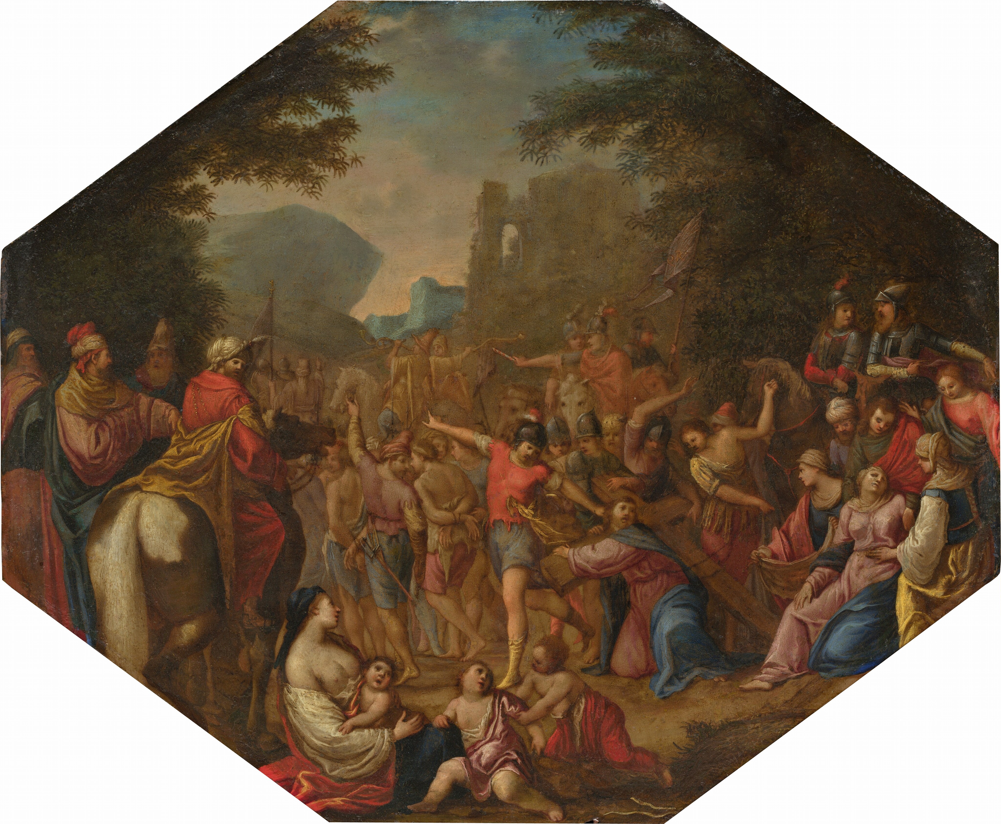 A man, Jesus, carries the crossbeam of a wooden cross over one shoulder and stumbles amid a crowd of dozens of people on foot, sitting, or on horseback in this wide, octagonal painting. All the people appear to have pale skin and wear robes in shades of ivory white, rose pink, ultramarine blue, soft red, or golden yellow. Two men walking away from Jesus have their wrists bound behind their backs. Two men near Jesus lift their arms and look at him, and Jesus looks back over one shoulder. The cross is taller than he is, so the long beam drags behind him. A woman has fainted to the right and is supported by four people. Another bare-breasted woman and three children sit at the bottom center of the composition. Dozens of men walk or urge the crowd along from horseback. Dark trees grow up either side of the painting, and cliff faces and a ruined structure are in the distance between. The low sun shades the clouds along the horizon peach, and the sky deepens to blue above bands of gray clouds.