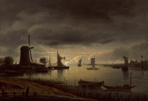 This painting features a landscape with a body of water stretching towards the horizon. The horizon includes dark windmills and sailboats silhouetted against the sky, with reflections on the still, yellow water. The sky is cloudy, and the setting sun at the center of the painting casts a pale-yellow glow across the center of the scene, while the edges are in shadow. Closest to us, there is grassy terrain with a wide dirt path and two rowboats near the water. The color palette is muted with browns, grays, and yellow tones.