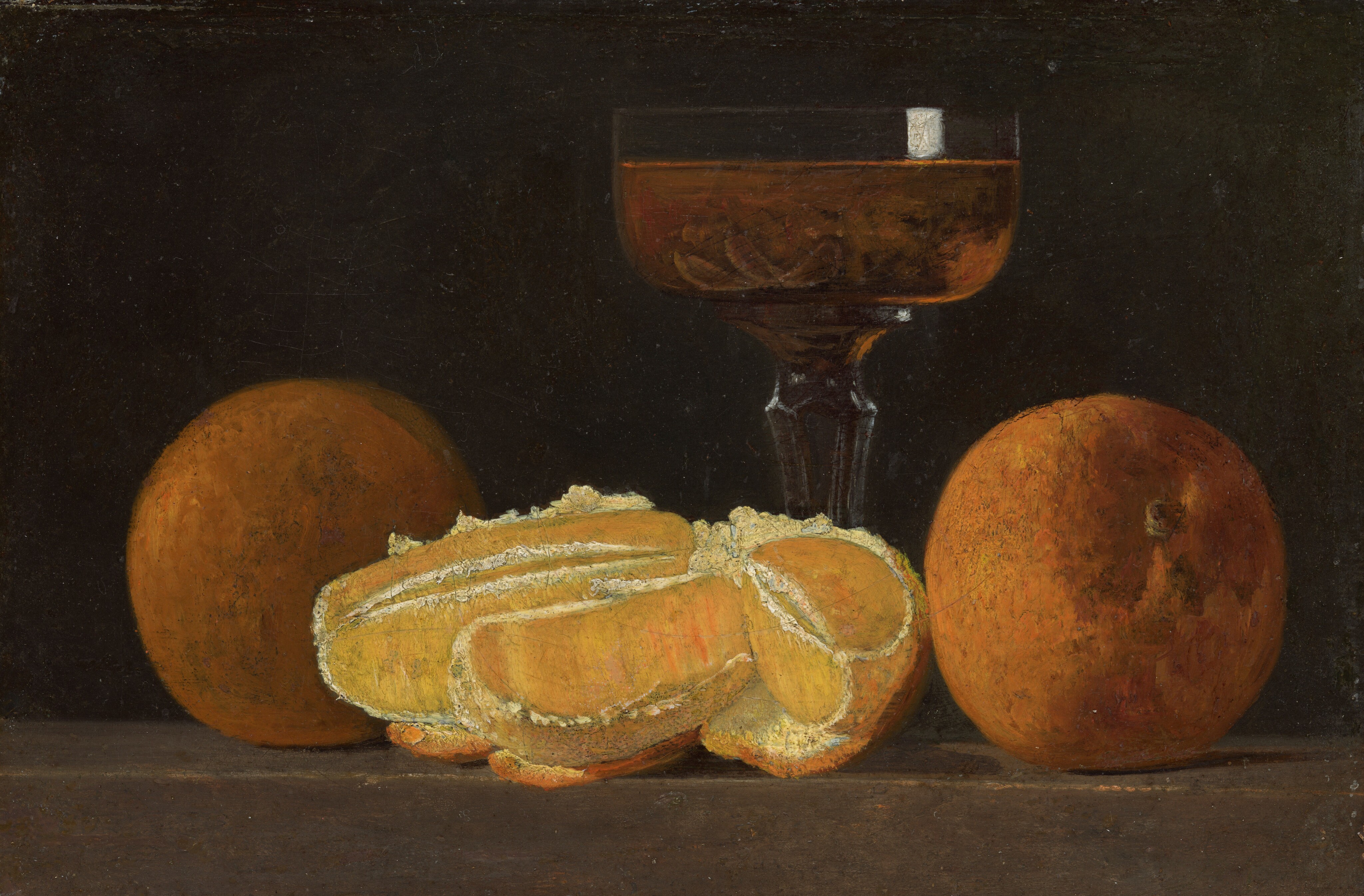 This painting depicts two whole oranges, a peeled orange, and a glass goblet filled with a dark orange liquid. The peeled orange is in the center, with the two whole oranges on either side. The glass goblet sits behind the oranges, partially hidden by the peeled orange. There are small orange rinds sitting at the bottom of the glass in the dark liquid. The objects rest on a light brown surface, and the wall behind them is black.