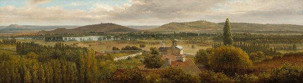 We look across the tops of trees down onto the roofs of a cluster of buildings and then a grassy expanse, a body of water, and rolling hills in this notably wide landscape painting. The trees are painted with shades of pine and olive green. At the center of the composition, the roofs are muted terracotta red with white chimneys except for the farthest structure, which has a gray roof around a lantern, perhaps indicating a church. Smoke puffs out of one chimney there. Trees with round canopies dot the pale, grassy field beyond that, which leads back to rows of tall, dark green cypress trees. A ribbon of ice blue across the left third of the painting indicates a body of water before russet-brown and muted sage-green hills roll into the deep, hazy distance. The horizon comes about two-thirds of the way up the painting, and glimpses of pale blue sky are visible through breaks in a blanket of pale gray and cream-white clouds above.