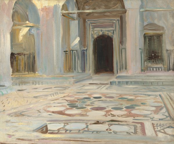 This nearly square, sketchy painting shows the interior of an empty courtyard, created in milky tones of oatmeal brown, ivory, muted brick red, eucalyptus green, and slate blue. We look across a floor patterned with round and octagonal stones. Across from us, a darkened, arched doorway is set into a larger, lighter arched opening. A niche or a window to our right is covered with a lattice. To our left, another arched opening angles toward us and to our left. It opens onto an indistinct space filled with golden light. Lighter strokes of pale mauve pink and warm parchment yellow on the face of the arch to our left suggests sunlight sifting into the interior space. Brushstrokes are visible throughout.
