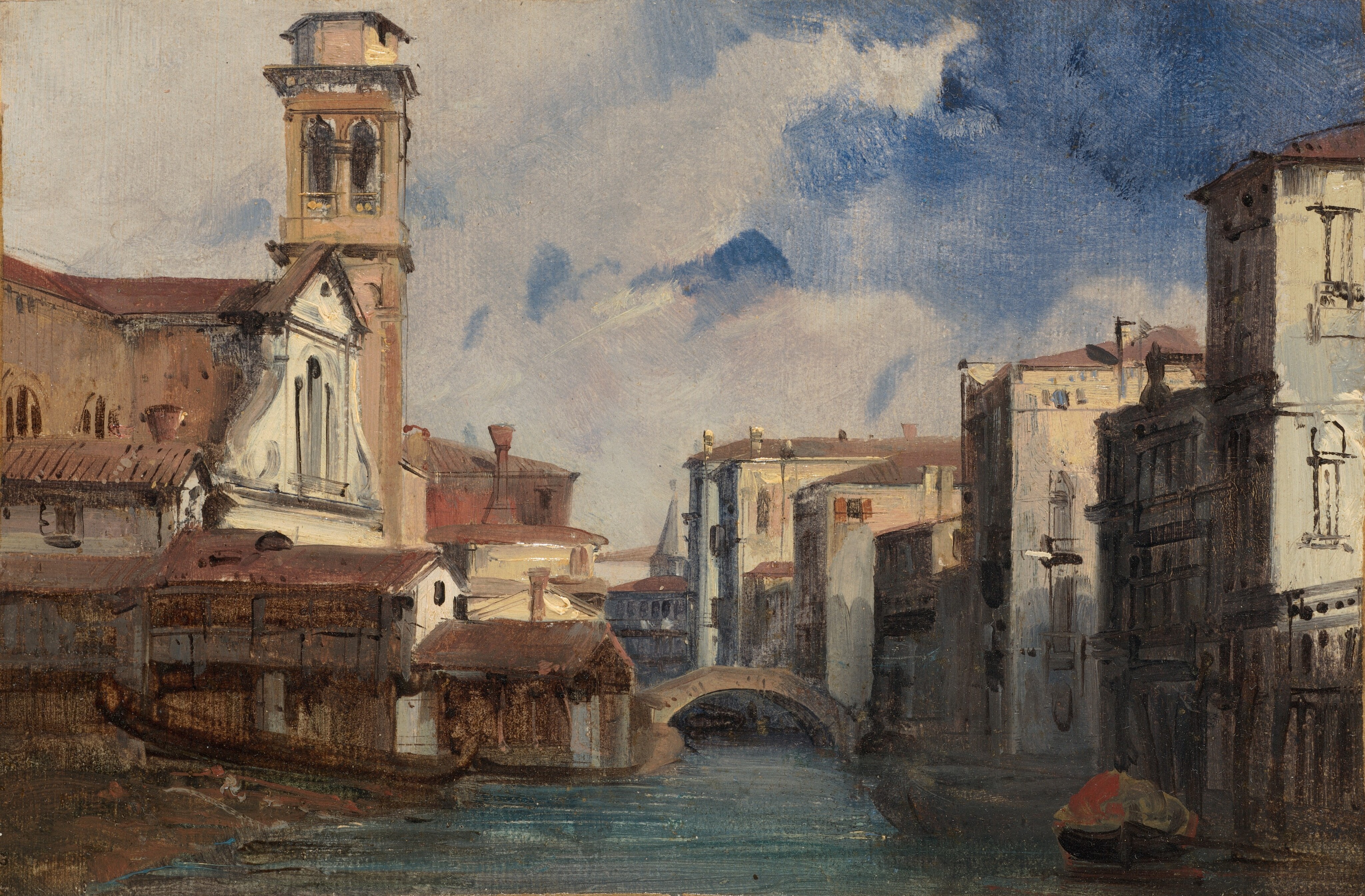 The painting depicts a canal with white and tan buildings lining either side. There is a church tower on the left, and in the distance the buildings create a path down the canal leading to an arched bridge. The buildings have reddish-brown roofs, and the front sides of the buildings on the right side are in shadow. On the left edge of the canal there are two long brown boats. The water is a green-blue color, and the sky is mostly light gray with areas of dark blue in the upper right corner