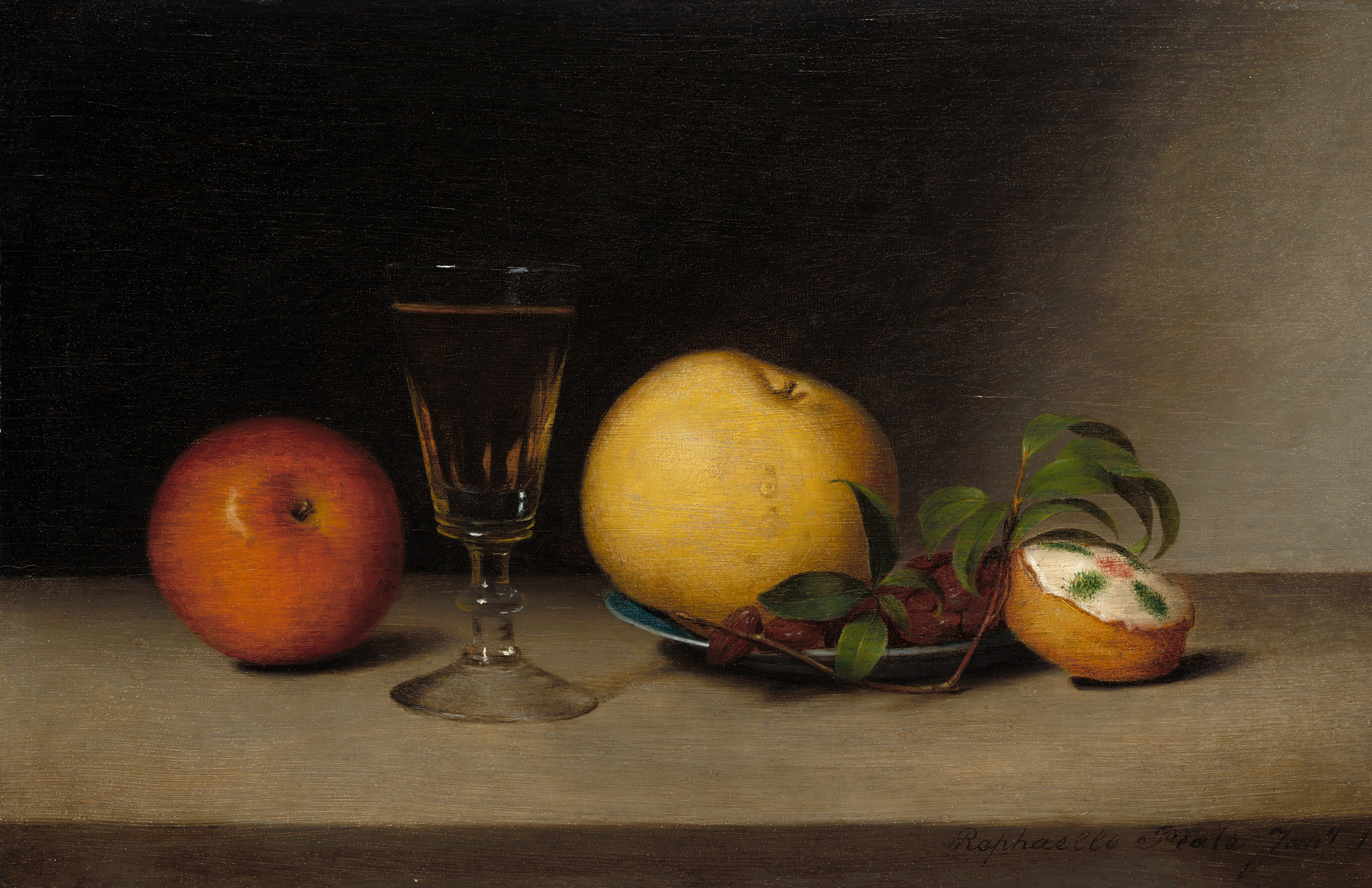 This painting is a still life featuring several objects arranged in a line. On the far left is a red apple with its stem toward us. Next to it is a transparent glass goblet with a hint of golden liquid inside. To the right of the glass is a blue plate with a large yellow apple next to what look like dark red dates or raisins. Resting beside the plate is a thin brown twig with green leaves. Farthest to the right is a small round yellow cake with white frosting, decorated with a pink dot in the center of the frosting and four green ovals around it. The surface these objects rest on is light gray, and they cast dark shadows, indicating light coming from the left. The wall behind the objects is mostly black, which transitions into a lighter gray color on the far-right side of the painting.