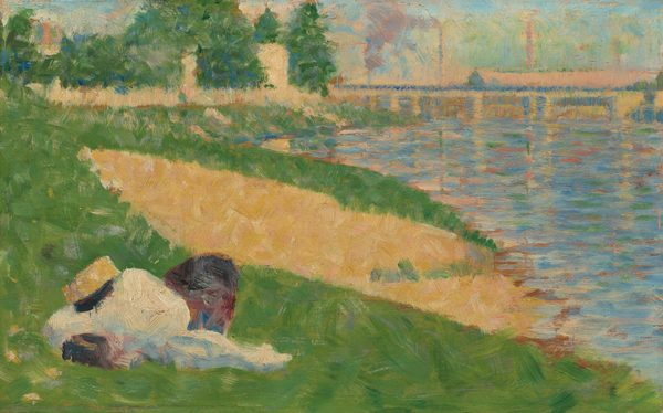 This painting depicts a scene by the water. Closest to us, a pile of objects sits on a grassy bank. The objects are indistinct, but there appears to be a white bundle with a gold-and-black object perched on it, surrounded by smaller round brown lumps. The green, grassy slope stretches off along the left, and it has a rectangular yellow section. On the right is a river or body of water painted in light blue with lines of green, red, and tan overlapping across the surface. In the distance, a large pale bridge stretches over the water, with vertical lines that look like smokestacks in the distance. Pale pink and purple smoke drifts up from one of them. On the left, tall, dark green trees surround light shapes that may be buildings. The sky is light blue-green. The brushstrokes in the painting are thick and visible, blending color and the edges between shapes, making details hard to identify.