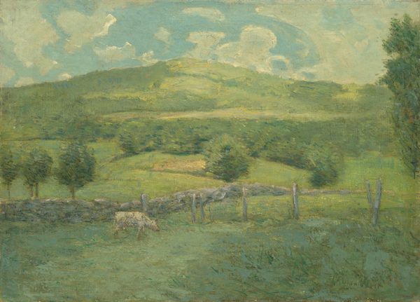 The painting shows a bright-green landscape with rolling hills in the distance. At the bottom of the painting, a white cow grazes in a green field framed by a wooden fence on the right and a diagonal stone wall on the left that continues off into the distance. Above the hills, the sky is light blue with several fluffy white clouds. The brushstrokes are loose and impressionistic.