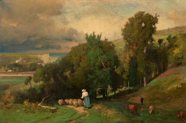 This painting depicts a rural landscape with a shepherdess tending to a flock of sheep on a tree-lined dirt path. She is facing away from us and wears a blue skirt with a white shirt and a white bonnet covering her hair. A green, grassy hillside with trees and grazing cattle is seen to the right, and the background on the left shows green fields and white cliffs under a cloudy sky.