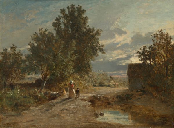 This horizontal painting presents a rural landscape scene centered on a dirt path that leads through a quiet countryside. The various brush strokes used, from smooth to textured, of oil paints on top of wood grain, combine elements of realism and landscapes. Starting at the lower left and moving across to the right, a wide, pale dirt road curves gently into the distance. The ground is uneven, with patches of grass and pebbles. Near the center of the composition, a woman with light skin stands on the path, her body facing away from us and slightly to the right. She wears a long dress with dull earth tones of reds, browns, and greens, and has light-gray colored hair. Besides her right, she holds the hand of a small child with light skin, who is dressed in darker clothing. Together, they stand atop a natural dirt bridge, walking along the curved path. To their left and rising above them, tall, dense trees and green-brown foliage dominate the scene. The trees' leaves contain shades of green and golden yellows, catching the soft, diffused light. On the right, a darker cluster of trees partially obscures a simple structure with a slanted roof, set back from the road. In the foreground at the lower right, a shallow pool of water reflects the sky in pale blue and gray tones. The sky fills the upper half of the painting with layered clouds, allowing warm light to break through, with a sun on the horizon. The overall piece utilizes colors of soft greens, browns, and grays, creating a calm, slightly hazy atmosphere