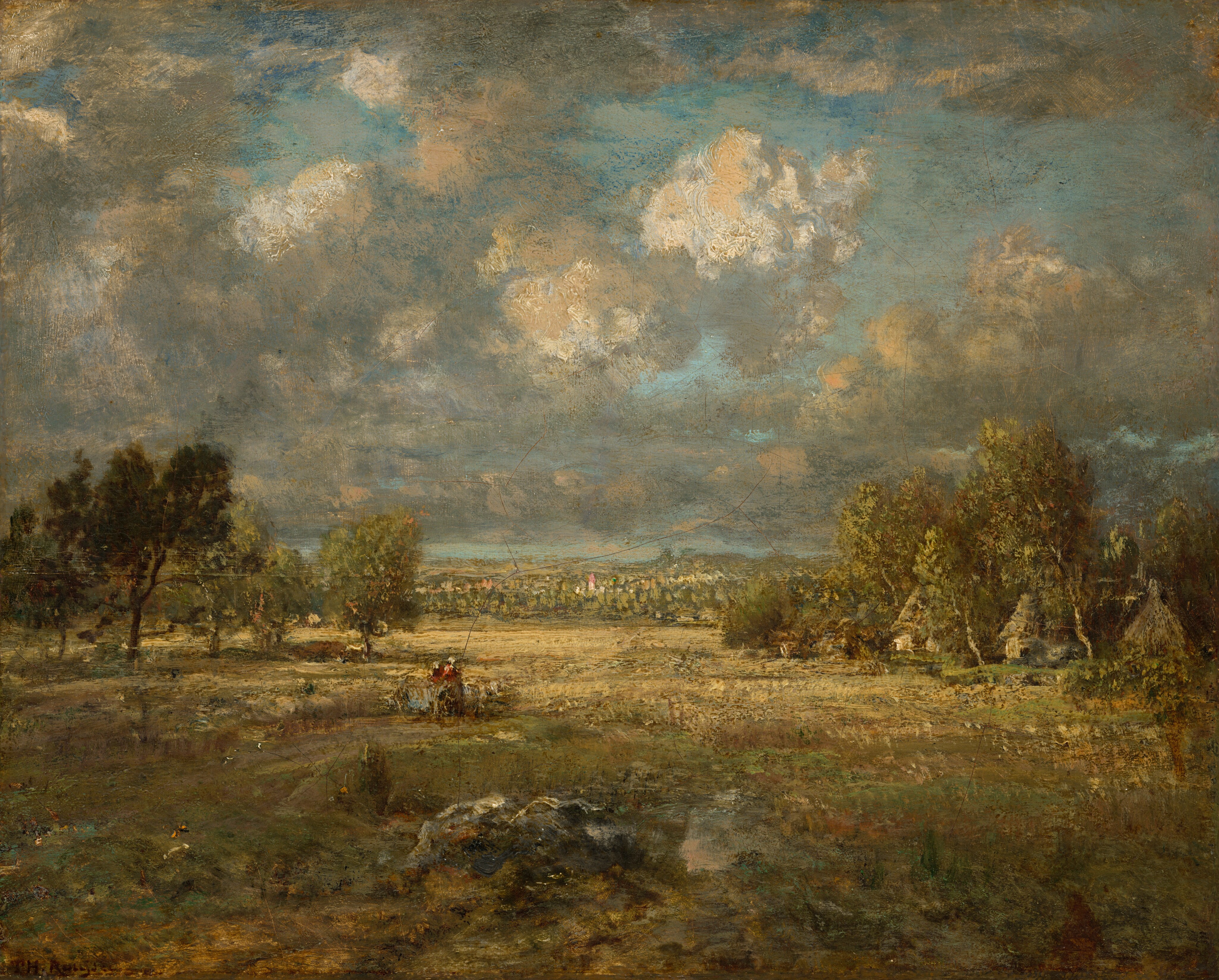 This painting depicts a landscape with an open green field stretching out into the distance. At the bottom of the painting, there is a rocky area with sparse vegetation and yellow, sun-bleached grass. Farther in the distance there are small groups of green trees, and some thatched-roof structures are partially obscured on the right. At the center of the painting there is a small area of red, suggesting a person or two walking along a brown path. Far in the distance there are small dots of white and pink, suggesting flowers or perhaps buildings. The color scheme is earthy and muted, dominated by browns, greens, and grays. The top half of the image is dominated by the sky, with textured white clouds swirling against patches of light blue.