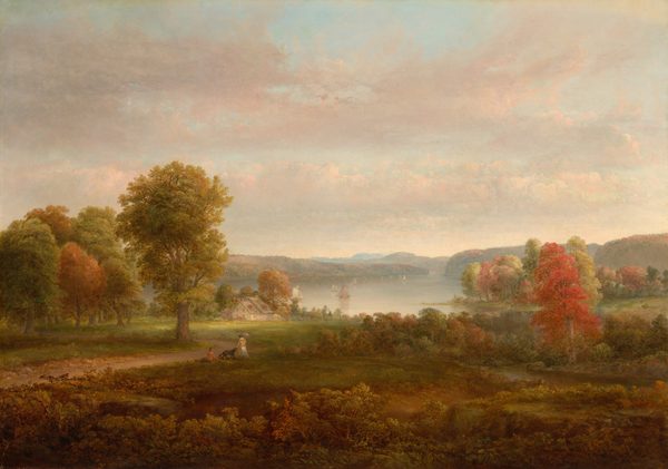 This painting depicts a rural landscape. The viewpoint is slightly elevated, offering a wide view of rolling hills, trees, and sailboats on a pale-blue body of water in the center. Closer to us, there is a grassy area with two people and a dog. Both people have their backs to us. One person is standing, wearing a white dress with a yellow jacket, and the other person is sitting, wearing a red shirt and brown pants. Various colors are present in the foliage, including greens, reds, and oranges, suggesting autumn. The sky is pale blue with pale pink clouds