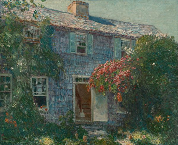 This painting shows a view of a house, focusing on the facade and entrance. The house is covered with blue shingles, and the front door is open, revealing a staircase. The house is surrounded by green trees, one of which is blooming with pink flowers. The front of the house has several windows, and the windows of the upper story have blue shades on either side of them. The roof is painted in white and light blue, and it has one central chimney in a pale peach color. The paint has been applied with visible brushstrokes in thin lines.