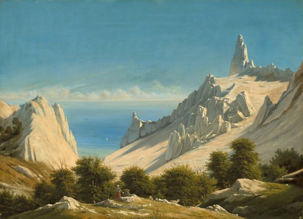 This painting shows a view of tall white cliffs on the left and right descending towards the vibrant blue sea. Small ships dot the water below. Two people towards the bottom of the painting look out across the cliffs with their backs to us. They are surrounded by gray rocks covered with light green grass, and there is a cluster of green trees in front of them. One person wears a dress and a shawl over their head, while the other wears a wide-brimmed yellow hat and appears to be holding a book or piece of paper.