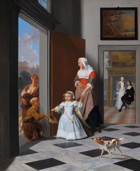 A child and woman stand at the open door of an entryway with black and white marble floors, as the child drops a coin into the hat of a disheveled boy accompanied by a nursing mother across the threshold in this vertical painting. Beyond the entryway, a man and woman look on from a room with a landscape painting hanging over a tall mantle. All the people have pale skin. The child standing with the woman inside, near the door, looks at us with gray eyes. Blond ringlets frame a round face with full cheeks, a snub nose, and parted coral-red lips. The ringlets are tied with butter-yellow ribbons and the rest of the head is covered with a white cap. The child’s garment has a wide, flaring, flat collar, a tight-fitting bodice, and a flaring, floor-length skirt. Pale plum-purple, puffy sleeves are tied with pale yellow and azure-blue ribbons, and a cape of the same fabric lined with pale grass-green falls from the shoulders. A medallion hangs from a thick gold chain looped over the child’s right shoulder, to our left, across to the opposite hip. The child touches the hand of the woman standing behind with one hand, to our right, and drops a silver coin into the proffered hat with the other. The woman’s body faces us but she turns her oval-shaped face to look down at the boy holding out his hat. She wears a scarlet-red, long-sleeved bodice with a wide, white collar over her chest. A taupe-brown apron covers her dark skirt and her bonnet is long on the sides, draping to brush her shoulders. She rests her right hand, to our left, on her stomach and touches the fingertips of the child in front of her with the other. Near the lower right corner of the painting, a small white dog with ginger-brown spots stands on the black and white marble floor, looking up toward the exchange. Light pours into the entryway through the open door and a transom window above it. The walls are light gray and the doorways are surrounded with darker gray molding. A painting of a landscape hangs above the doorway leading to the room beyond. The man and woman there look at us from in front of a mantle that is taller than the woman who stands next to the man, who is seated. The woman’s hair is pulled back under a cap, and she wears a silver-gray dress lined with a wide band of white fur. She holds one hand to her waist and gestures toward the foyer with the other. The man wears a black suit with a wide, flat collar. The floor in this room is a checkerboard pattern of white and brick-red  squares, and sky-blue panels with gilded leafy designs cover part of the walls. A carved stone cherub like a small, chubby child, stands on the mantle to our left, next to the landscape painting there. Back in the entryway, across the threshold, the boy steps with one foot onto the floor of the foyer as he holds out his frayed, brimmed hat. He has short-cropped blond hair and wears a mustard-yellow shirt with tattered brown pants. The nursing woman stands next to the door, out of sight of the people inside, holding a baby to one round breast. The boy and woman’s faces, necks, and hands are noticeably tanned, almost orange. Two small children huddle, almost out of sight, in the narrow space between the boy and the left edge of the painting. They look down onto a few light tan disks, perhaps coins, on the step in front of them. In the distance beyond the family are a few trees and buildings beneath a vibrant blue sky with puffy white clouds. The artist signed and dated the painting in the lower right corner, “J. Ochtervelt f. 1663.”
