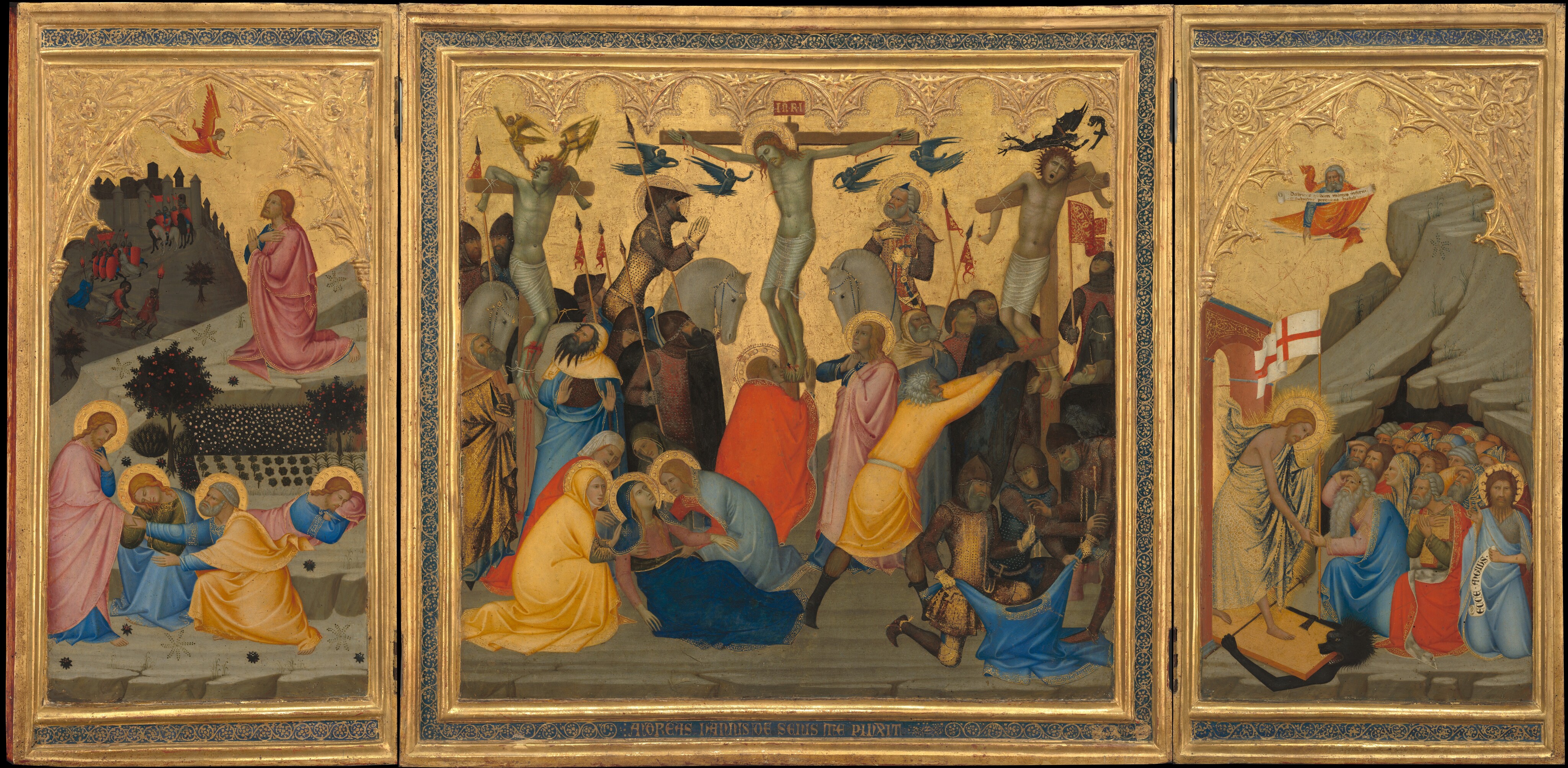 A square panel flanked by two tall, rectangular panels all have gold frames and shimmering gold backgrounds behind groups of people, all of whom have light skin. On the square, central panel, three men hang on wooden crosses above people crowded below. The crucified men wear only white cloths across their hips and their skin has a green cast. A halo encircles the bent head of the man on the middle cross, Jesus, who wears a ring of thorns in his long, red hair. Blood trickles down his forehead and drips from nails driven through his hands and overlapped feet, and from a gash over his right ribs, to our left. Four miniature, winged angels are painted entirely in tones of dark, cobalt blue, and they fly in pairs on either side of his body. A panel at the top of the cross reads “INRI” in gold letters against a red field. The other two crosses are spaced evenly to either side. The men are tied with their elbows hooked unnaturally back over the crossbeams, and wounds on their broken shins pour blood. The man to our left tilts his head up as one small, golden angel touches the back of his head and the other lifts a miniature version of the man from his parted lips. To our right, the man’s eyes roll back and his mouth gapes open as two black, winged creatures like dragons fly overhead. In the bottom left corner, a group of four women cluster around a recumbent woman with long blond hair wearing a blue cloak. In the right corner, a group of three men tug at a blue tunic, as they draw straws from one man’s fist. Other men and women, a few with gold halos, cluster at the foot of the crosses, wearing robes and armor in shades of buttercup yellow, coral and brick red, light and lapis blue, and brown. The left tall, rectangular panel shows a haloed man, Jesus again, kneeling on a flat rock above a stylized garden. Hands crossed over his chest, he looks up in profile facing our left at a small angel with a red gown and wings offering a chalice. Closer to us, Jesus appears for a second time in this panel, greeting a bearded man wearing blue and golden yellow as two others sleep behind them. All four have halos. On a hill beyond the garden, to our left, a group of men holding long spears and tall shields chase a man with a black halo. In the right panel, Jesus strides from under an archway across a wooden door that lies flat along the ground as it pins and crushes a black beast. Jesus wears a bright, gold-patterned cloth draped over one shoulder and around his body. He holds a tall pole with a flag with a red cross on a white field with his left hand. His other clasps hands with an elderly man with gray hair and long white beard. Behind the elder man, a crowd of men and women kneel in front of the opening of a craggy cave. One man holds a scroll with black letters that reads, “ECCE ANGIUS.” Another bearded man floats above holding a scroll that reads, “DESTRUXIT QUIDAM MORTES INFERNI ET SUBVERTIT POTENTIAS DIABOLI.” Gold frames around all three panels, which are attached with hinges, have an inset band of lapis blue with a scrolling, leafy design in gold. Above each scene, architectural arches and tracery is created in low relief in gold against the gold-leaf background. In the lower center of central panel, in the blue band, the work is signed, “ANDREAS UANNIS DE SENIS ME PINXIT.”