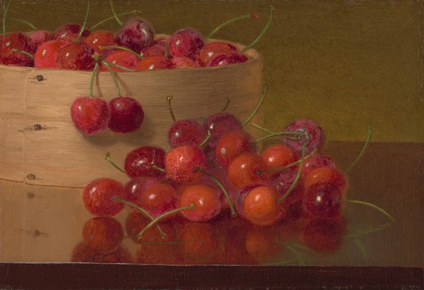 This painting shows a shallow wooden container filled with bright cherries in different shades of red on a brown surface. Some cherries have spilled in front of the basket; they are reflected in the polished brown surface beneath them. The cherries have bright green stems that crisscross and overlap with one another. The wall in the background is dark yellow-green color.