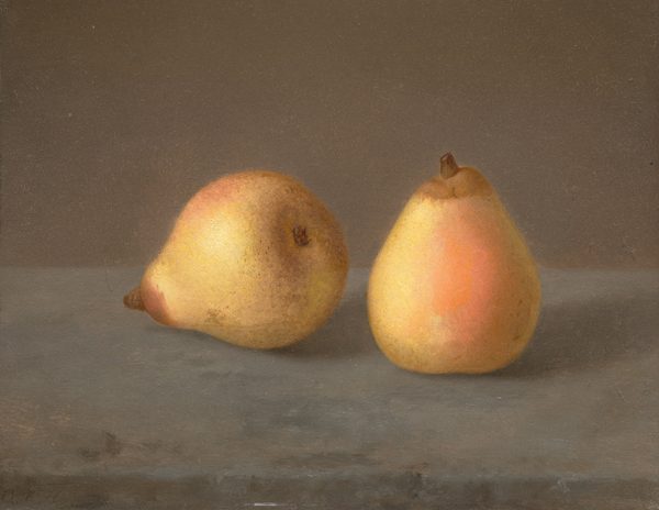 The image shows two pears, one lying on its side to the left and the other upright to the right. The color palette includes muted yellows, soft pinks, and browns against a light grayish-brown background. Both pears are on a flat surface; the pear on the left leans slightly into the image, while the upright pear to the right captures a highlight emphasizing its round form.