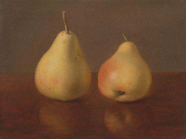 In this painting, two large pears are placed side by side on a wooden surface. The pears are predominantly a pale-yellow color, but there are areas of light pink and red. The pear on the left is larger and set upright, while the pear on the right is shorter and angled slightly downward, away from us. They both have light green stems. Both pears cast reflections on the wooden surface beneath them. Behind the pears is a plain gray wall.