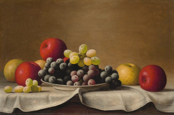 This painting shows clusters of dark purple, light green, and pinkish grapes on a white cloth-covered table, with large red and yellow apples on the table behind the plate. A small cluster of green grapes spills onto the table in the bottom left.  The fruit and plate cast dark shadows on the cloth. The cloth on the table is creased, and the surface below is dark brown. The wall behind the fruit is tan.