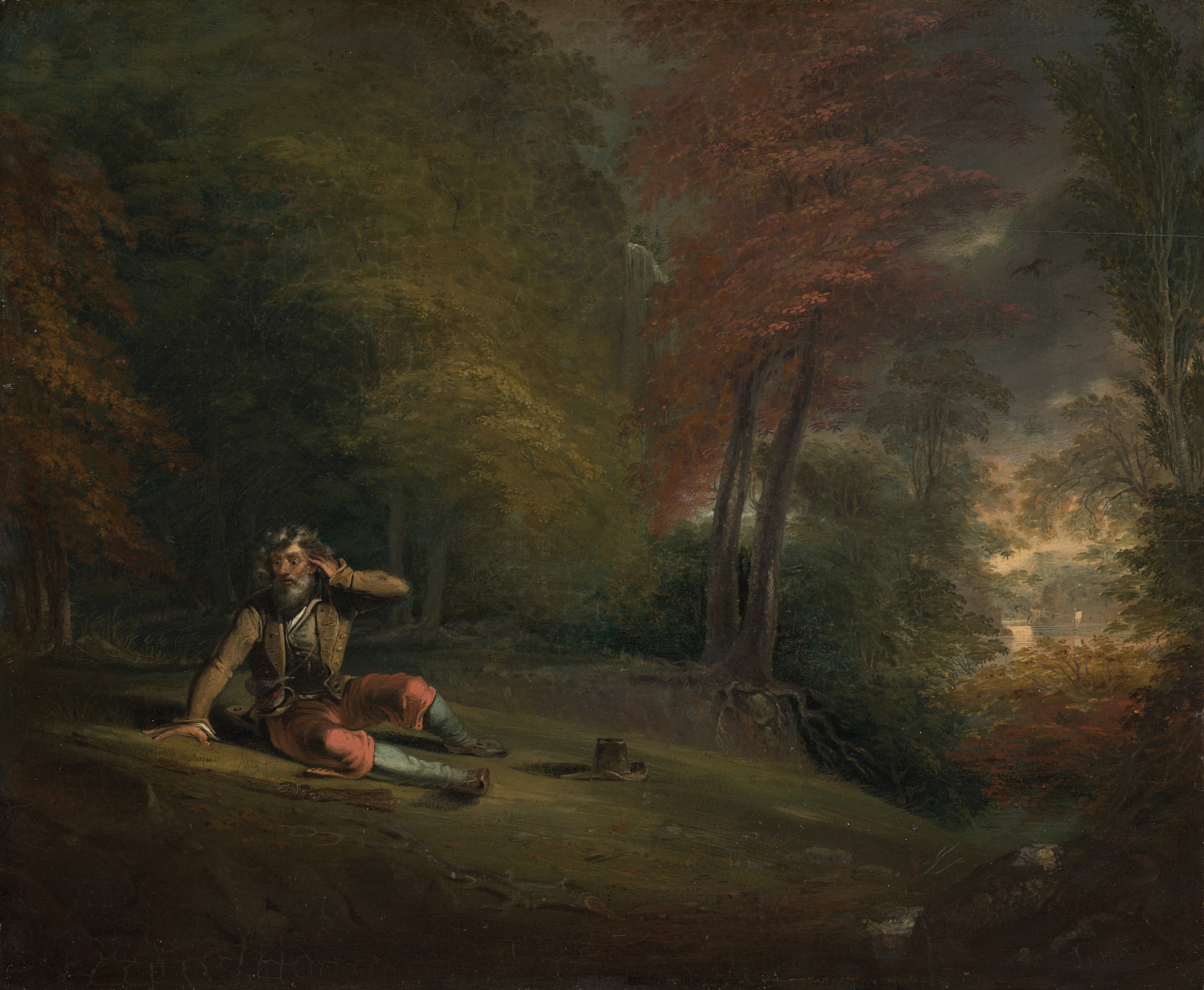 This painting shows a man sitting on the ground in a woodland setting. On the right, light in the distance suggests an opening in the trees, which shows a small body of water with a white sailboat on it, barely visible through the foliage. The trees have dense leaves in shades of green, dark red, and burnt orange. In the center is an open green patch where the man sits on the left. He has pale skin, curly gray hair, and a gray beard. His eyes are wide, and one of his hands is raised to his head. He wears a brown jacket over a brown-green vest, red trousers, blue stockings, and brown shoes, a hat and rifle on the ground beside him. He is illuminated by a patch of light, while the rest of the forest is dark, aside from the opening on the right.