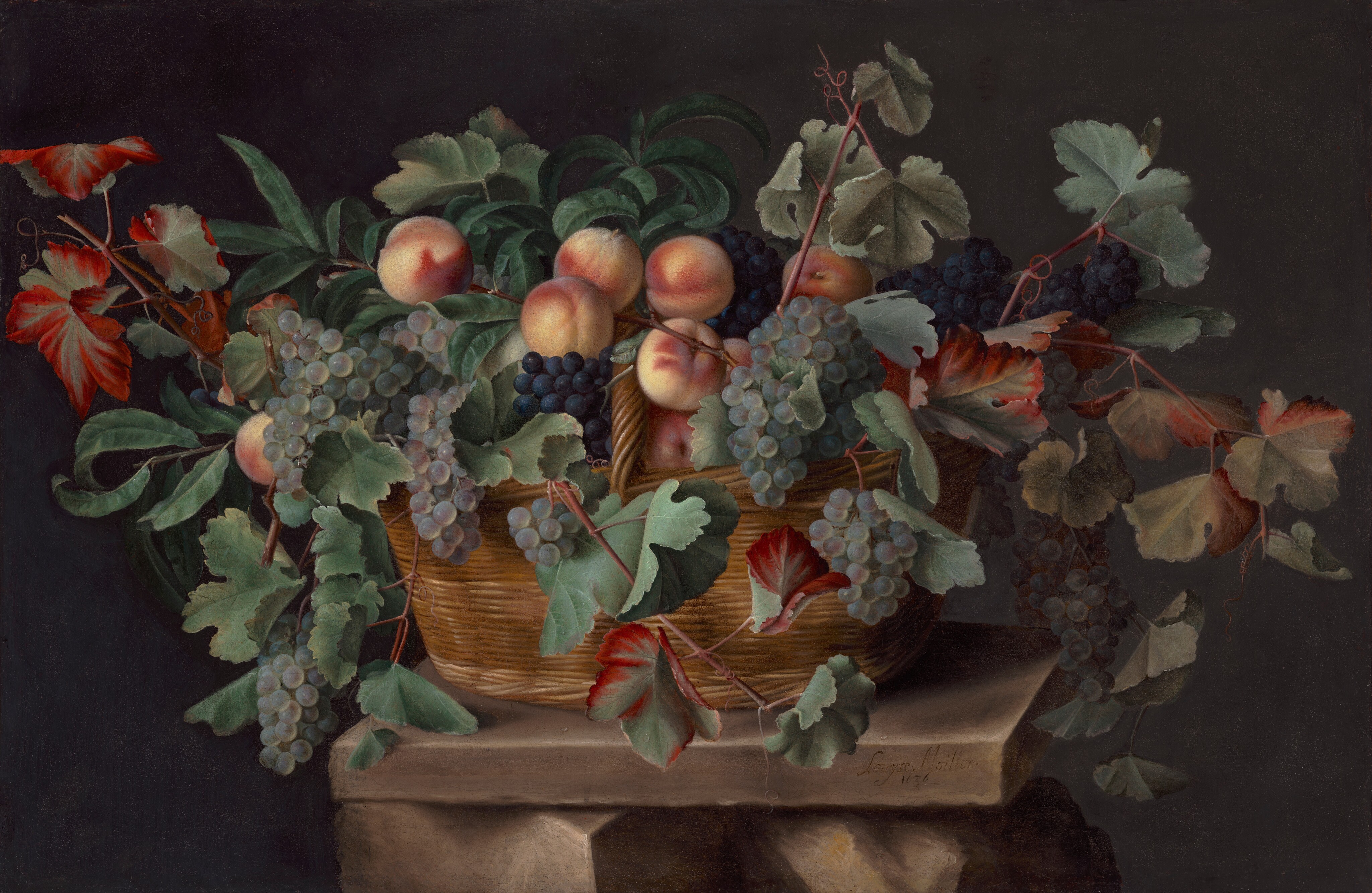 In this painting, a woven basket on a stone ledge contains peaches, black grapes, green grapes, and wide green leaves. Peaches are placed prominently at the top of the pile, with grape clusters overflowing on either side. The green leaves and red-tinted grapevine leaves are scattered around. The gray stone surface is visible under the basket, and the background is black.