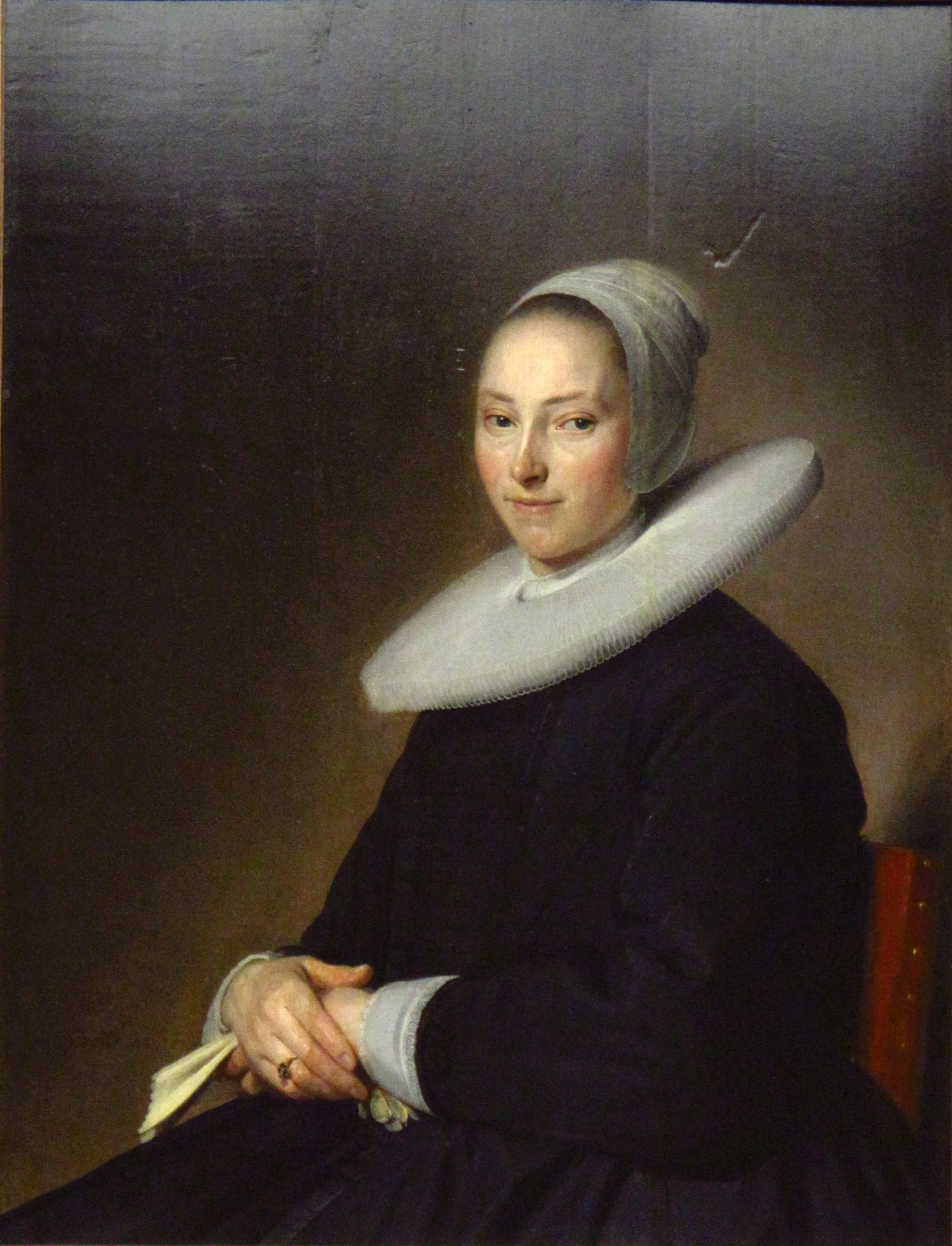 French: Portrait d'une jeune femme assise by Johannes Cornelisz Verspronck