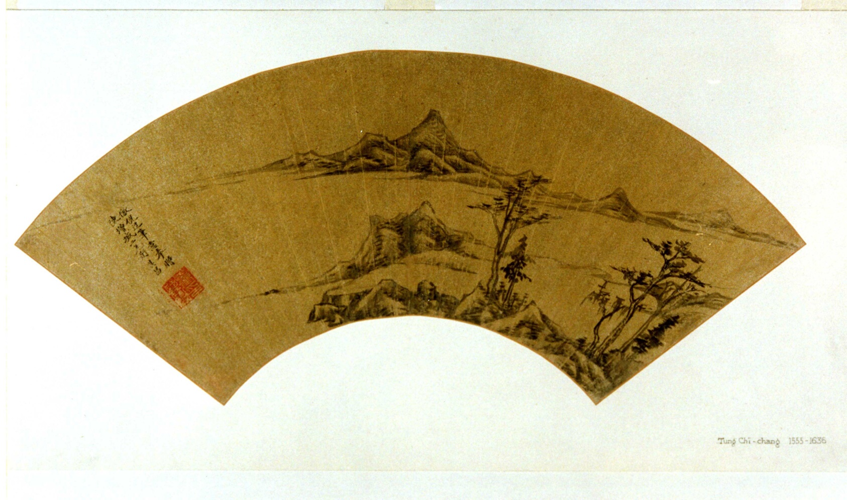 A work made of folding fan mounted as an album leaf; ink on gold paper.